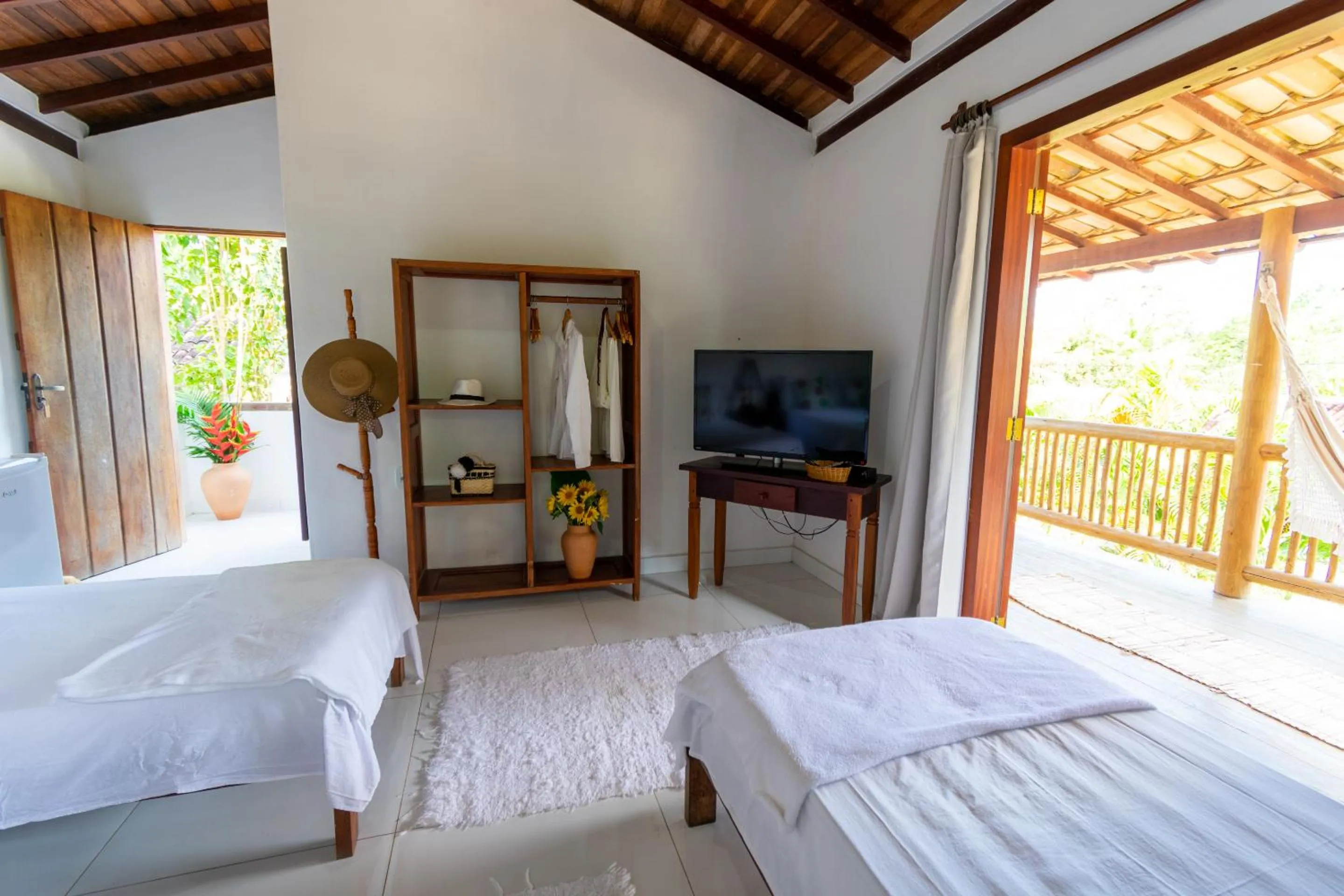 Bed in Pousada Jequitibá