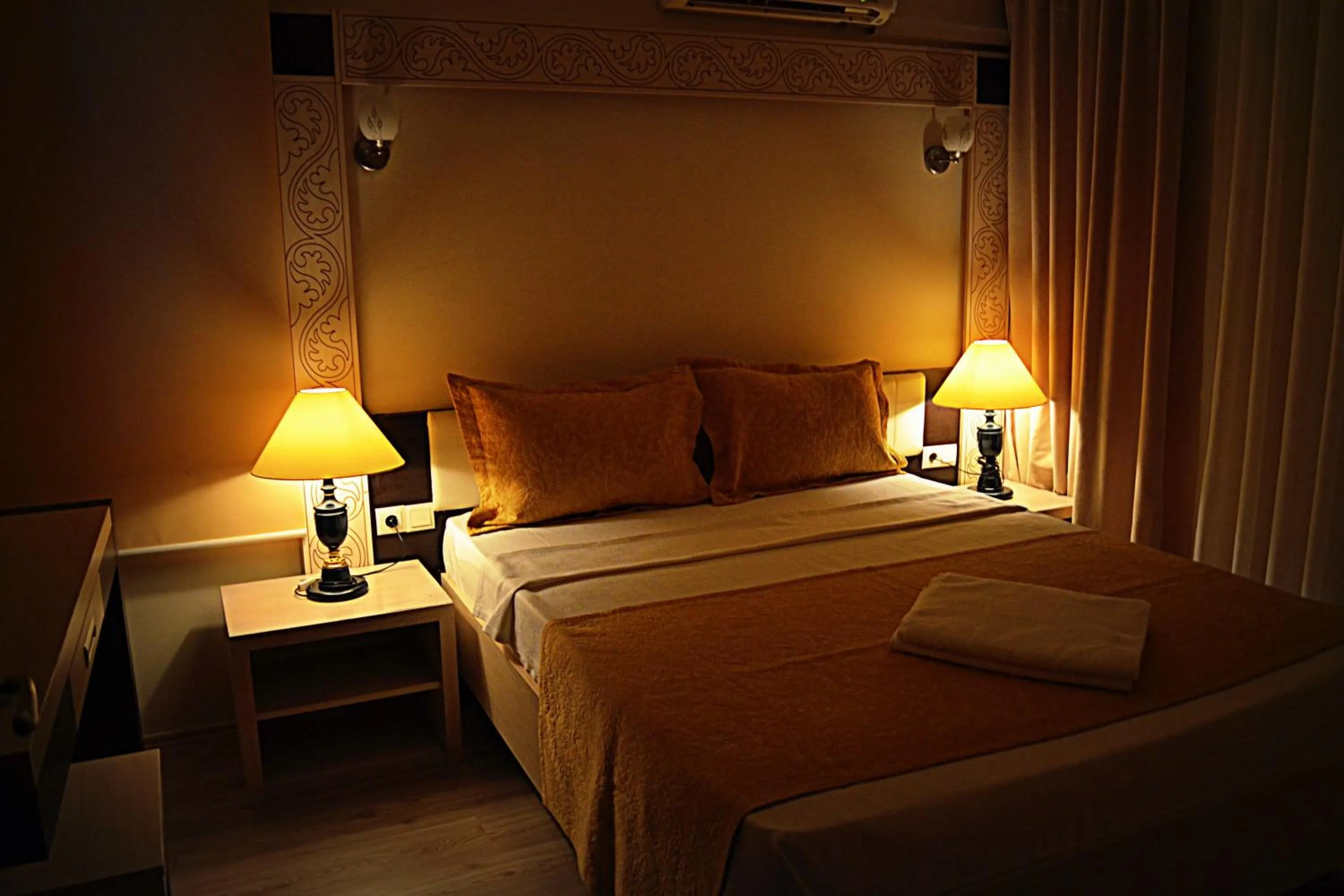 Bed in Rumana Hotel