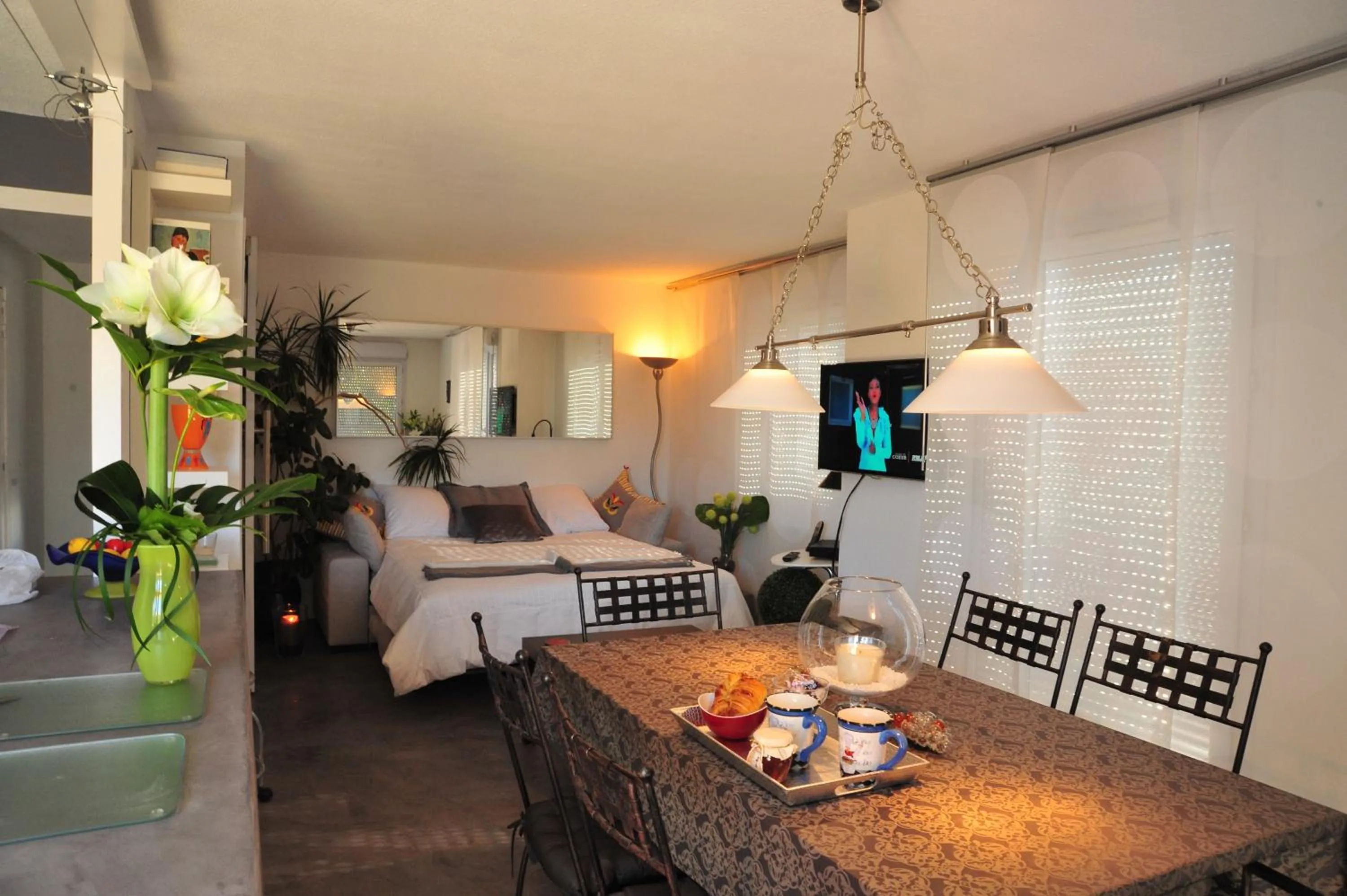 Living room, Bed in Magic Moments Appartement