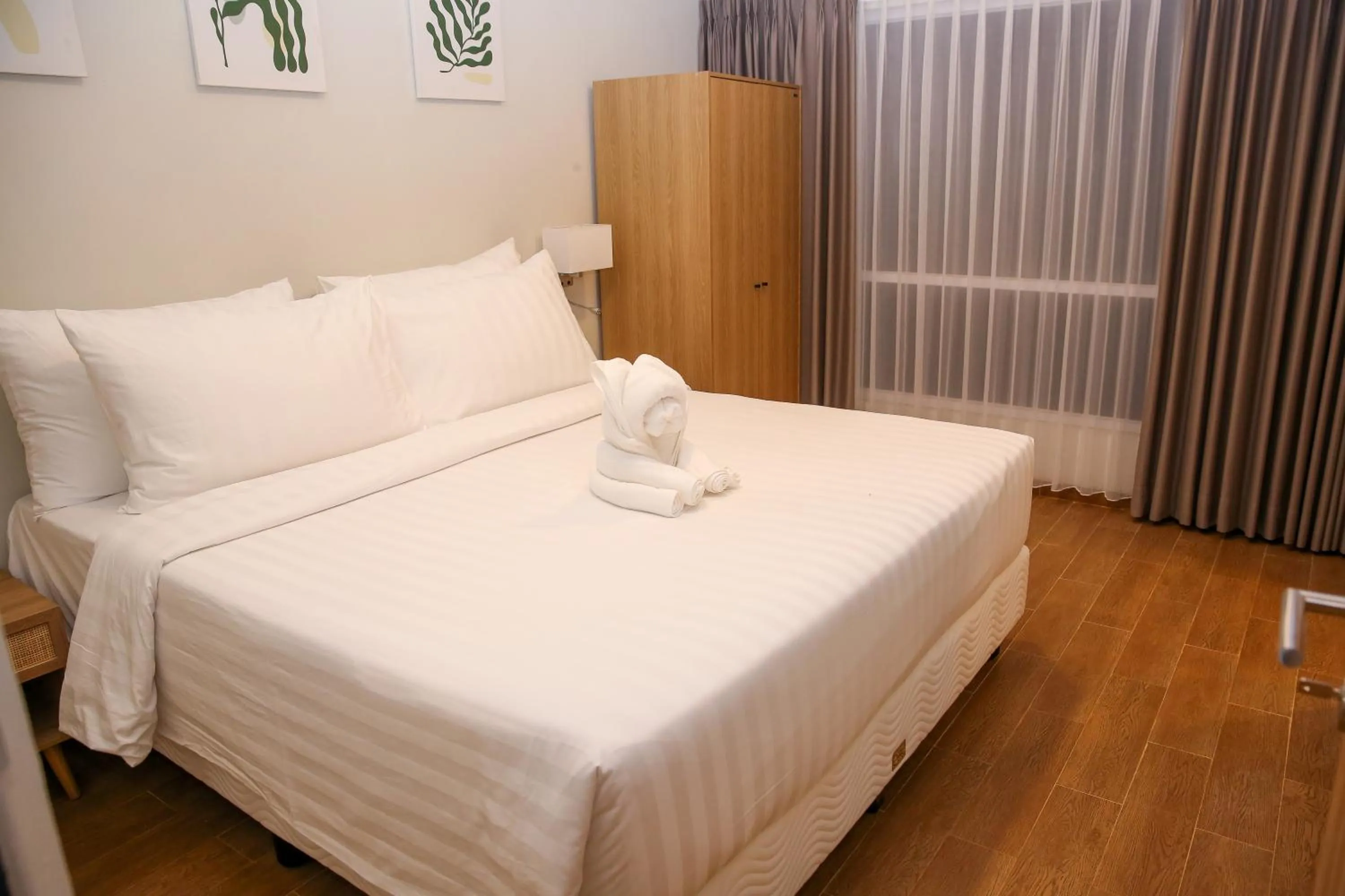 Bed in Avery Coconut Island Waterpark Beach Resort Carita