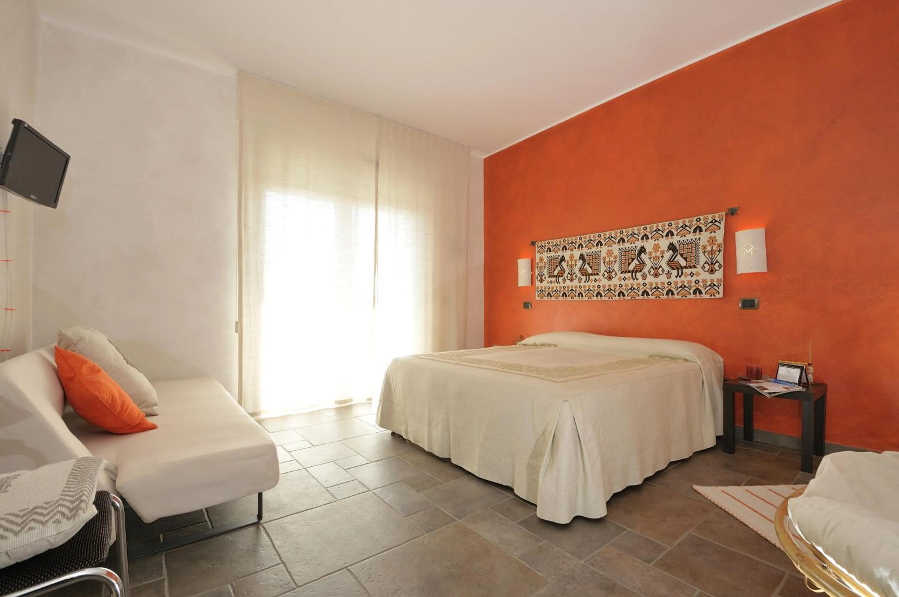 Photo of the whole room, Bed in Le Stanze di Patika