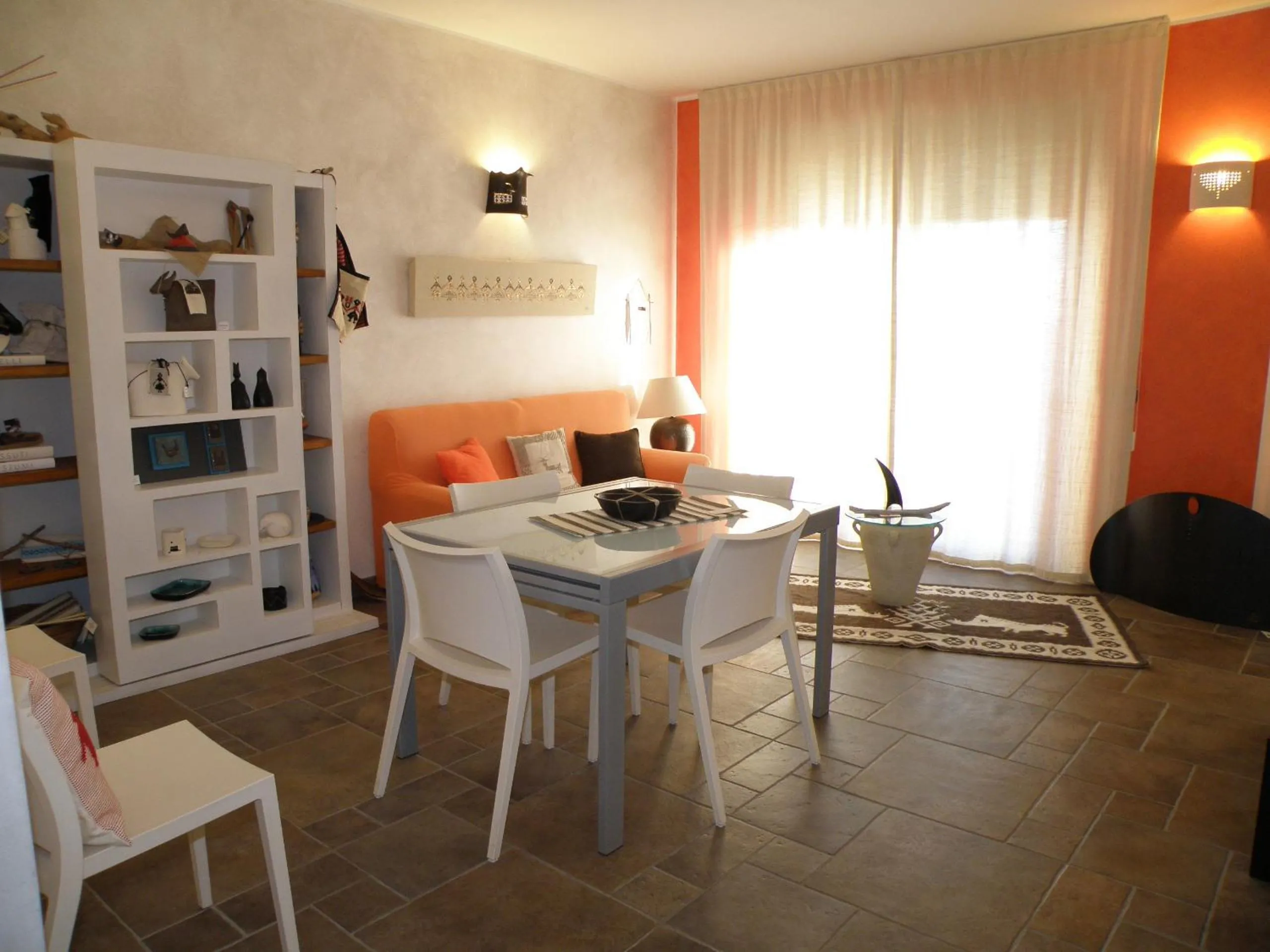 Communal lounge/ TV room in Le Stanze di Patika