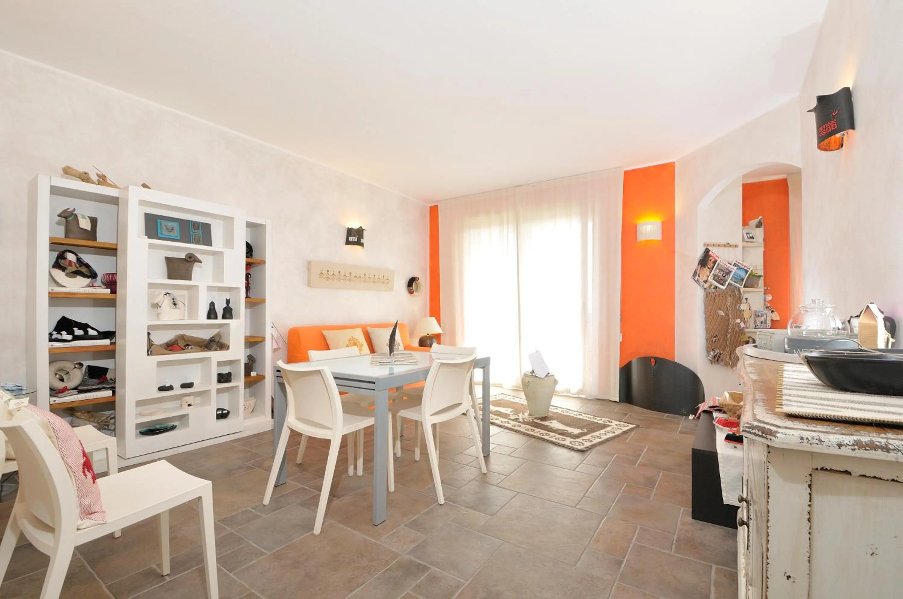Communal lounge/ TV room in Le Stanze di Patika