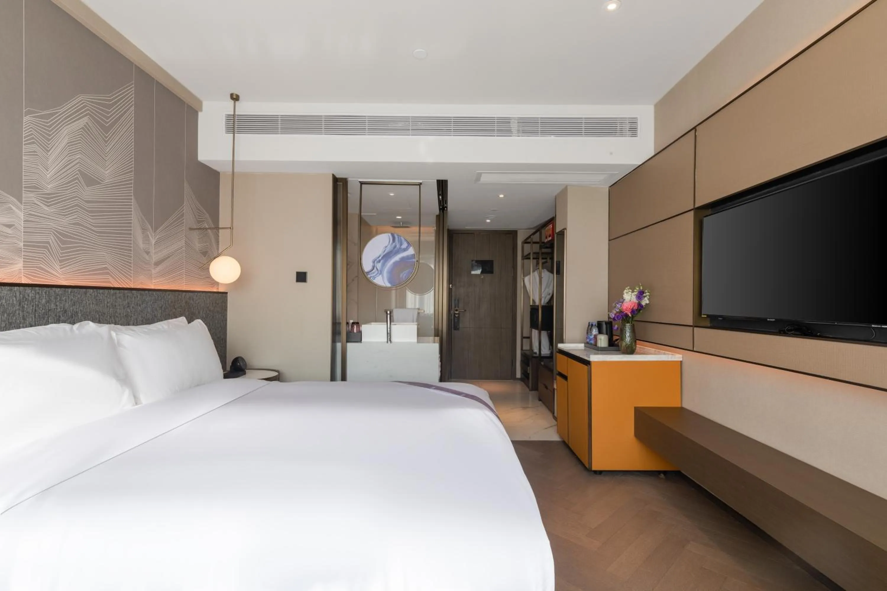 Living room, Bed in Amber East Hotel