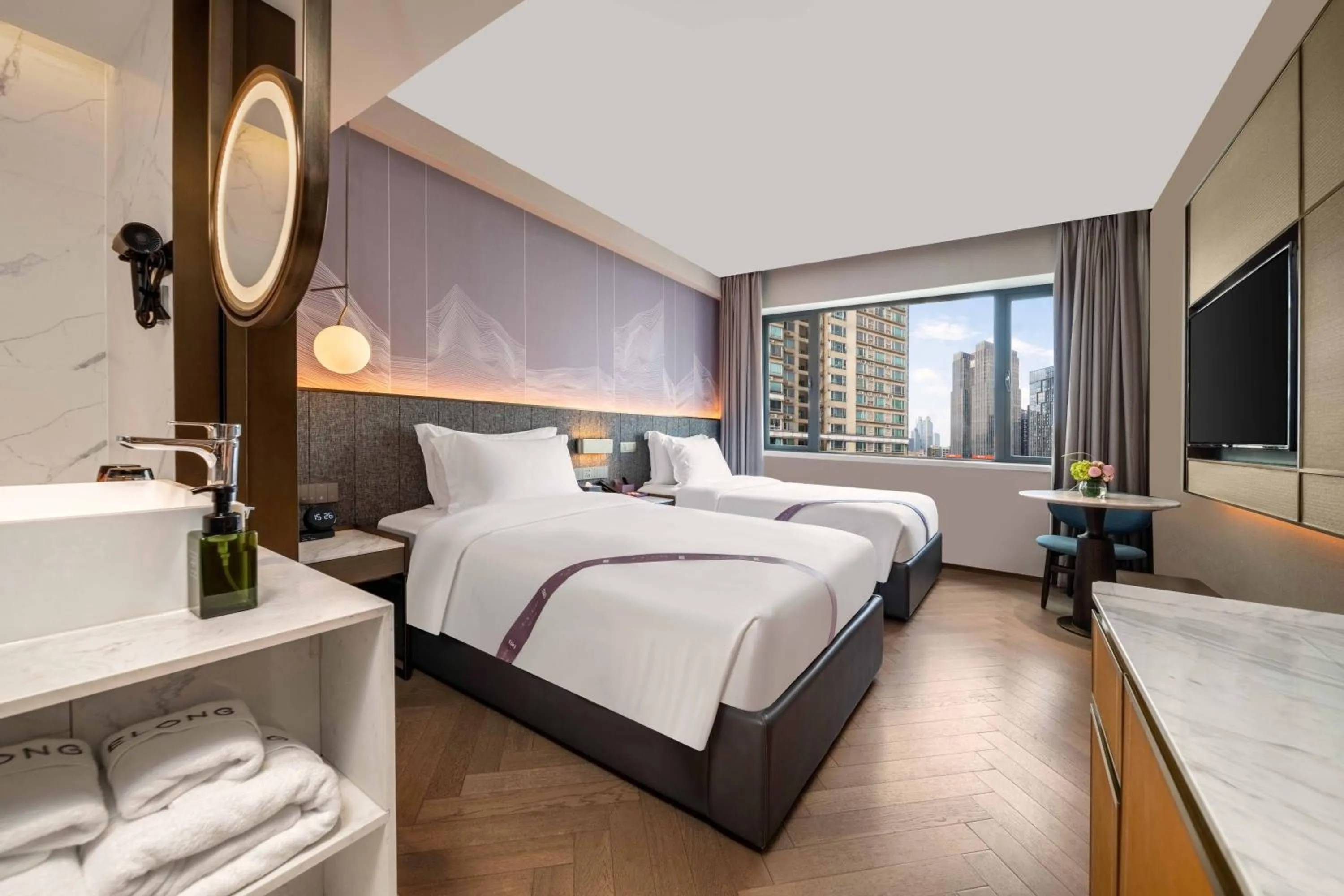 Bed in Imperial Traders Elong Hotel