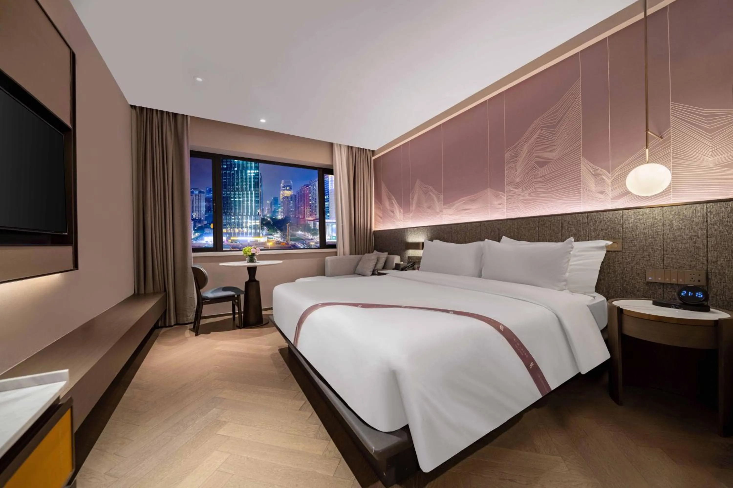 Bed in Imperial Traders Elong Hotel