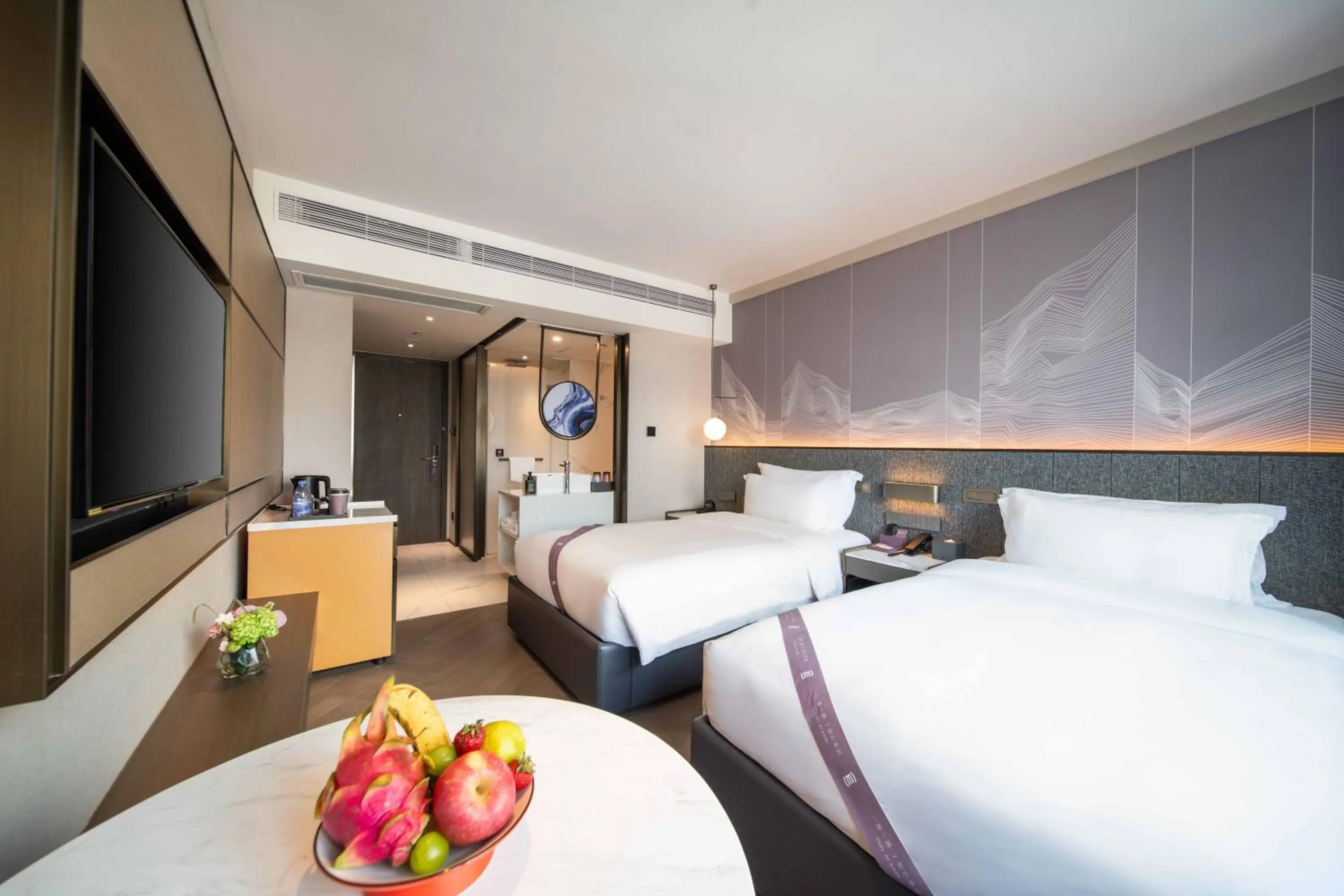 Bed in Imperial Traders Elong Hotel