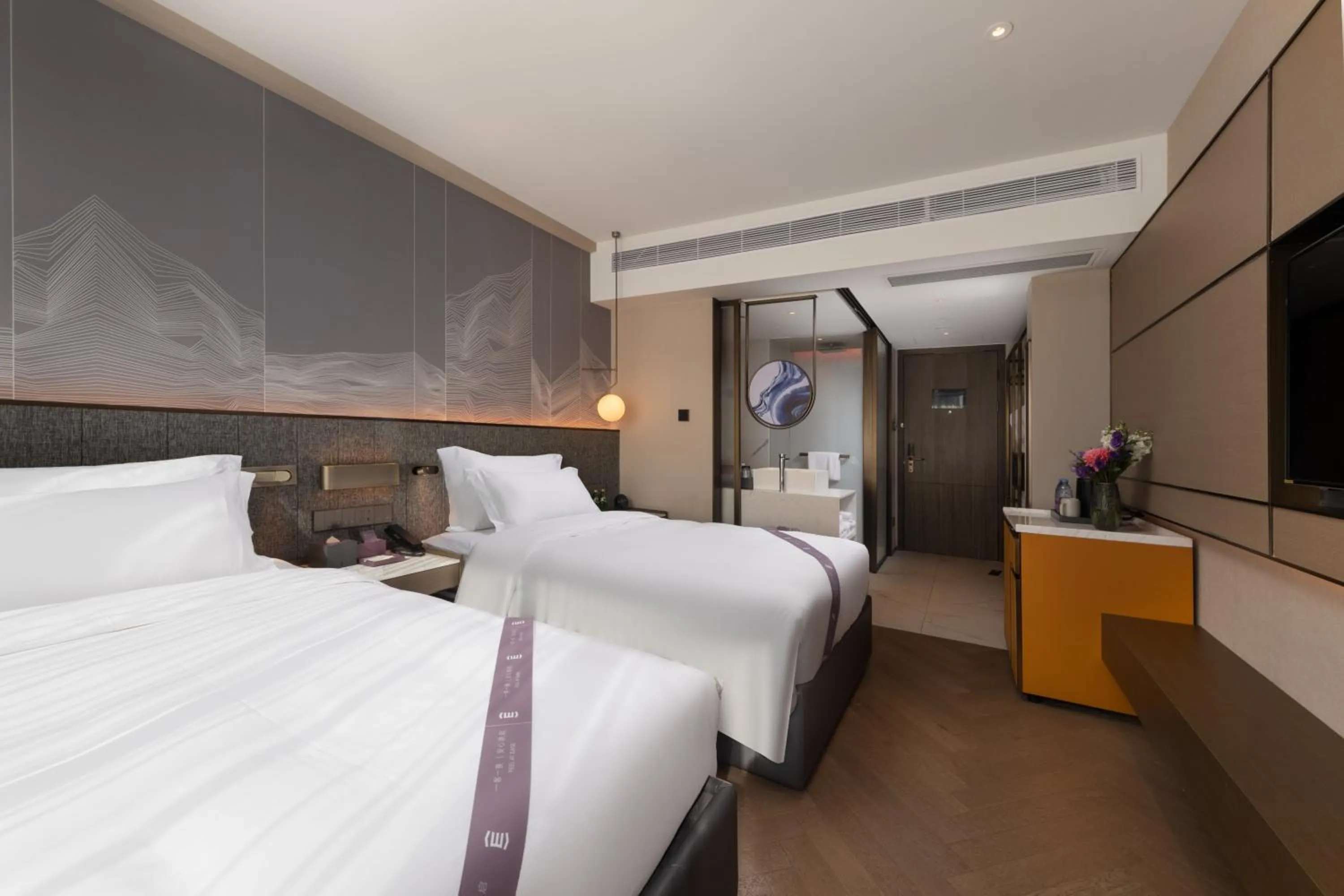 Bed in Amber East Hotel