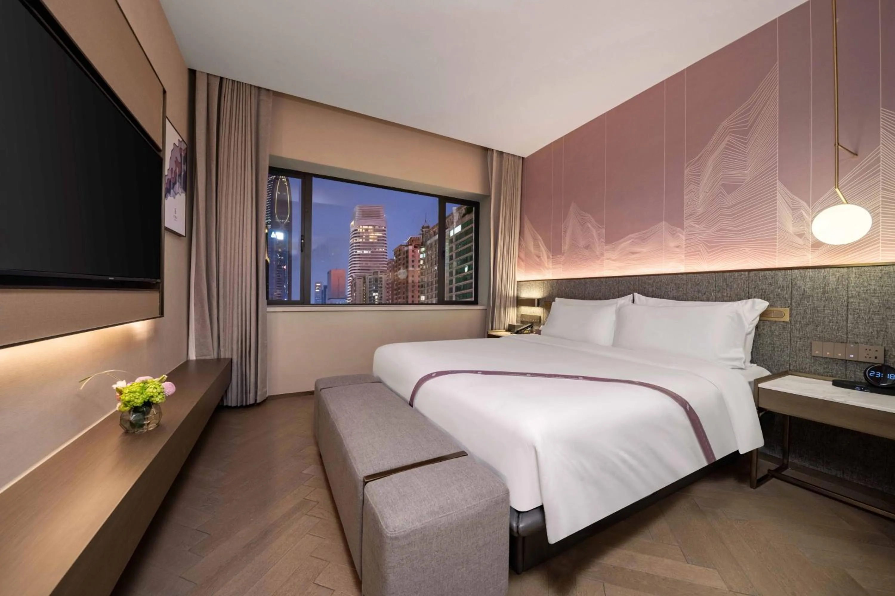 Bed in Imperial Traders Elong Hotel