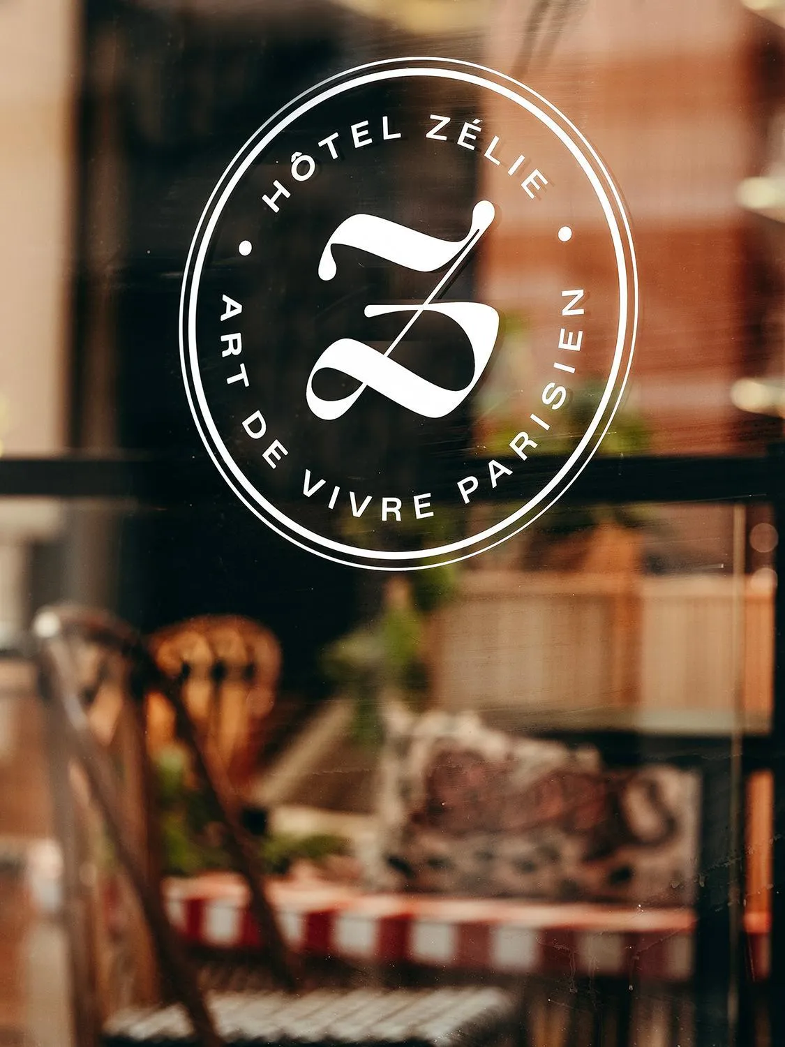 Property logo or sign in Hôtel Zélie Champs-Elysées