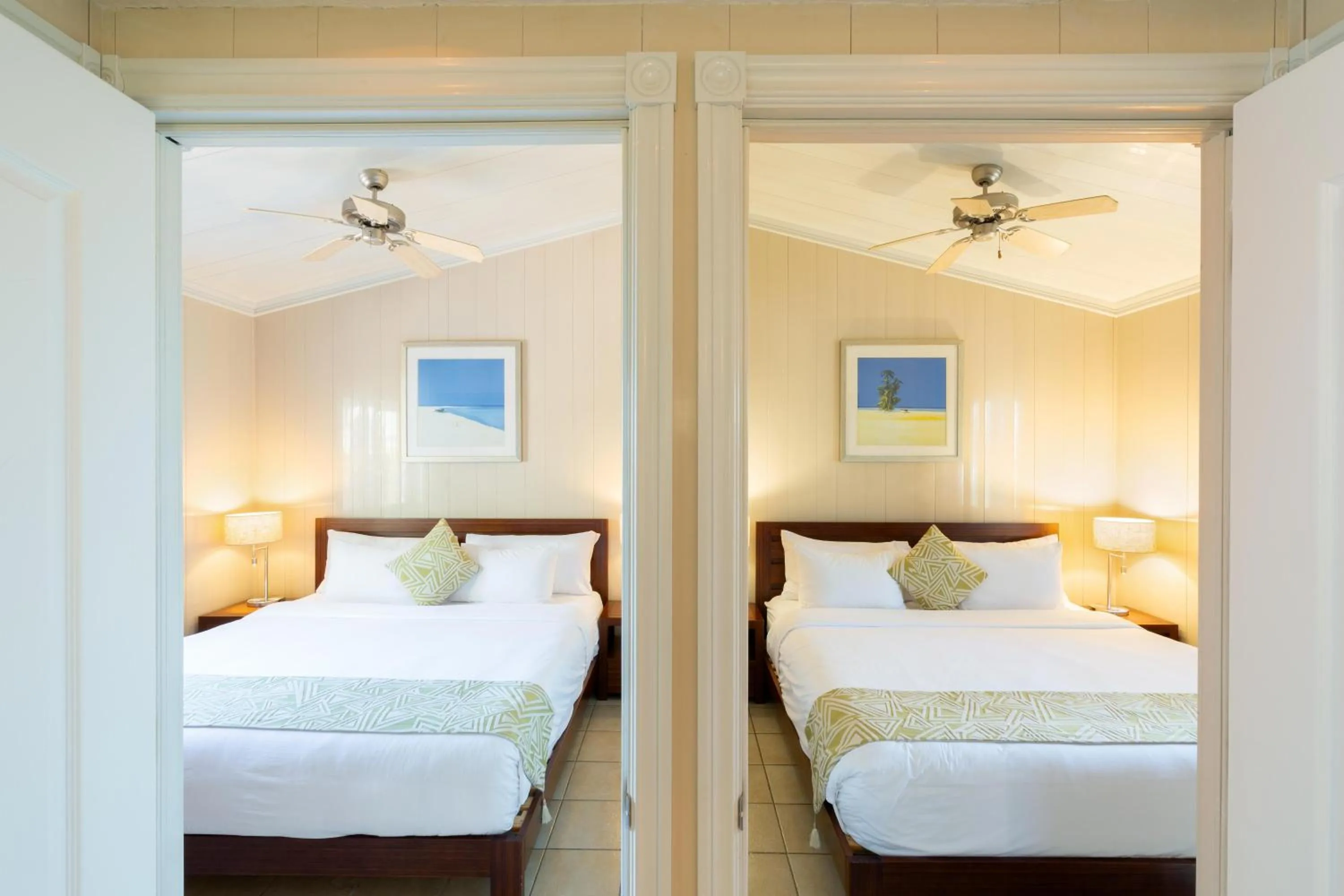 Photo of the whole room, Bed in Kokomo Botanical Resort - Caribbean Family Cottages