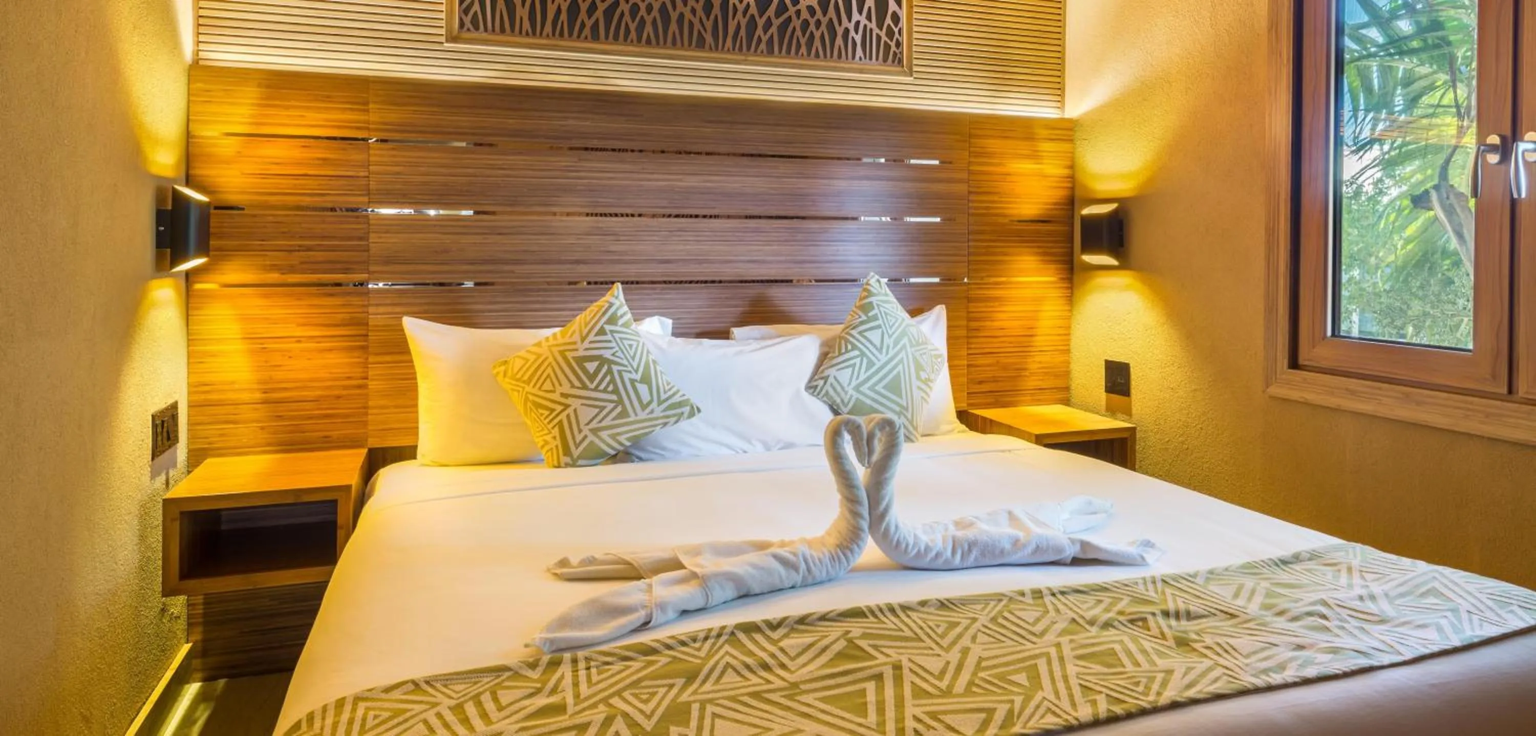 Photo of the whole room, Bed in Kokomo Botanical Resort - Caribbean Family Cottages