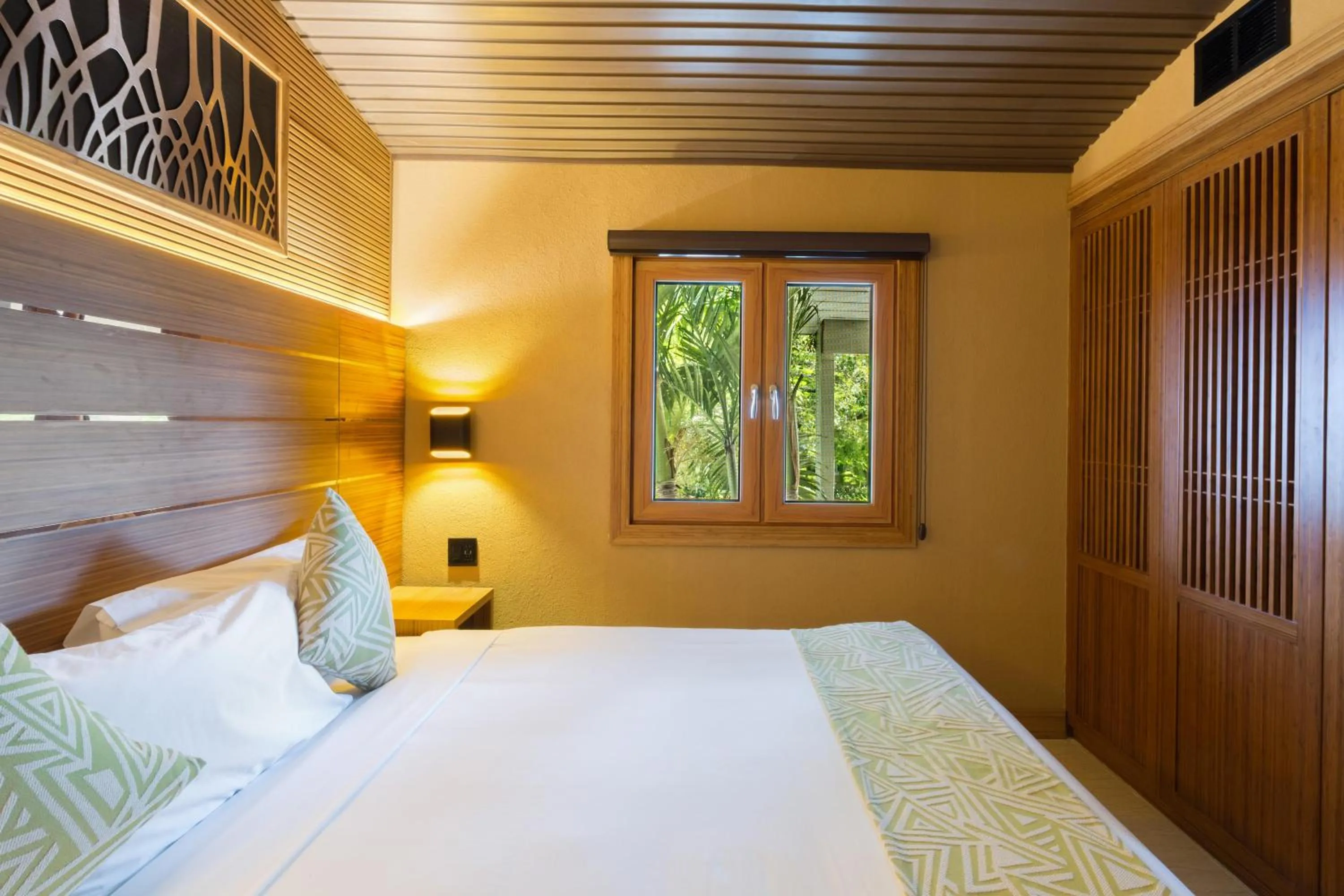 Photo of the whole room, Bed in Kokomo Botanical Resort - Caribbean Family Cottages