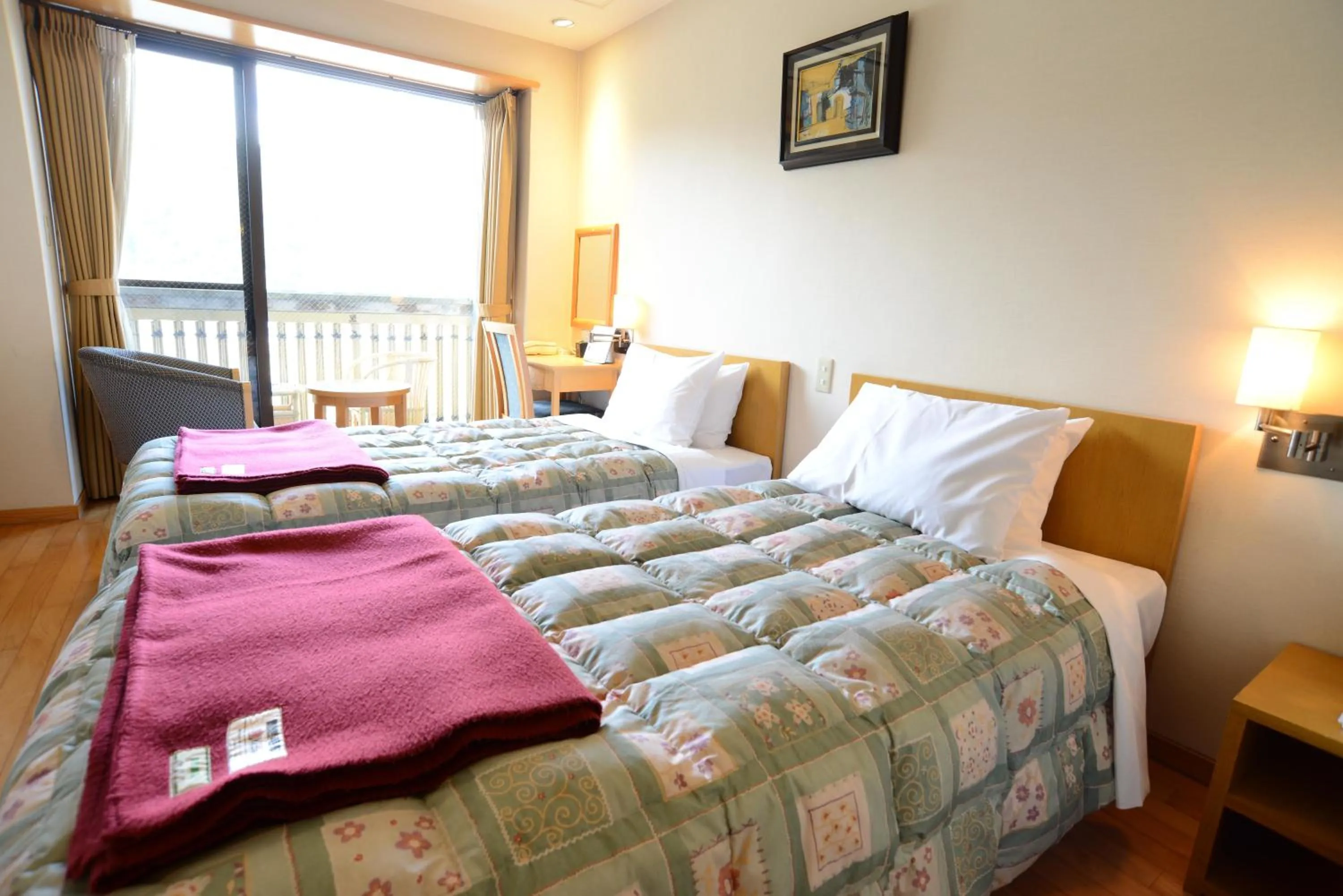 Photo of the whole room, Bed in Iwakuni Kokusai Kanko Hotel
