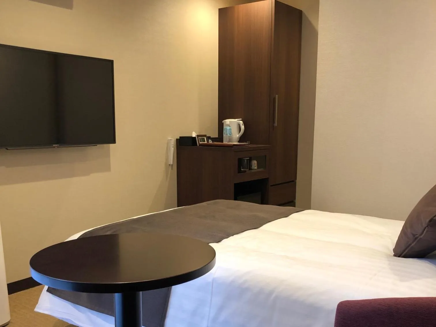 Bed in Iwakuni Kokusai Kanko Hotel