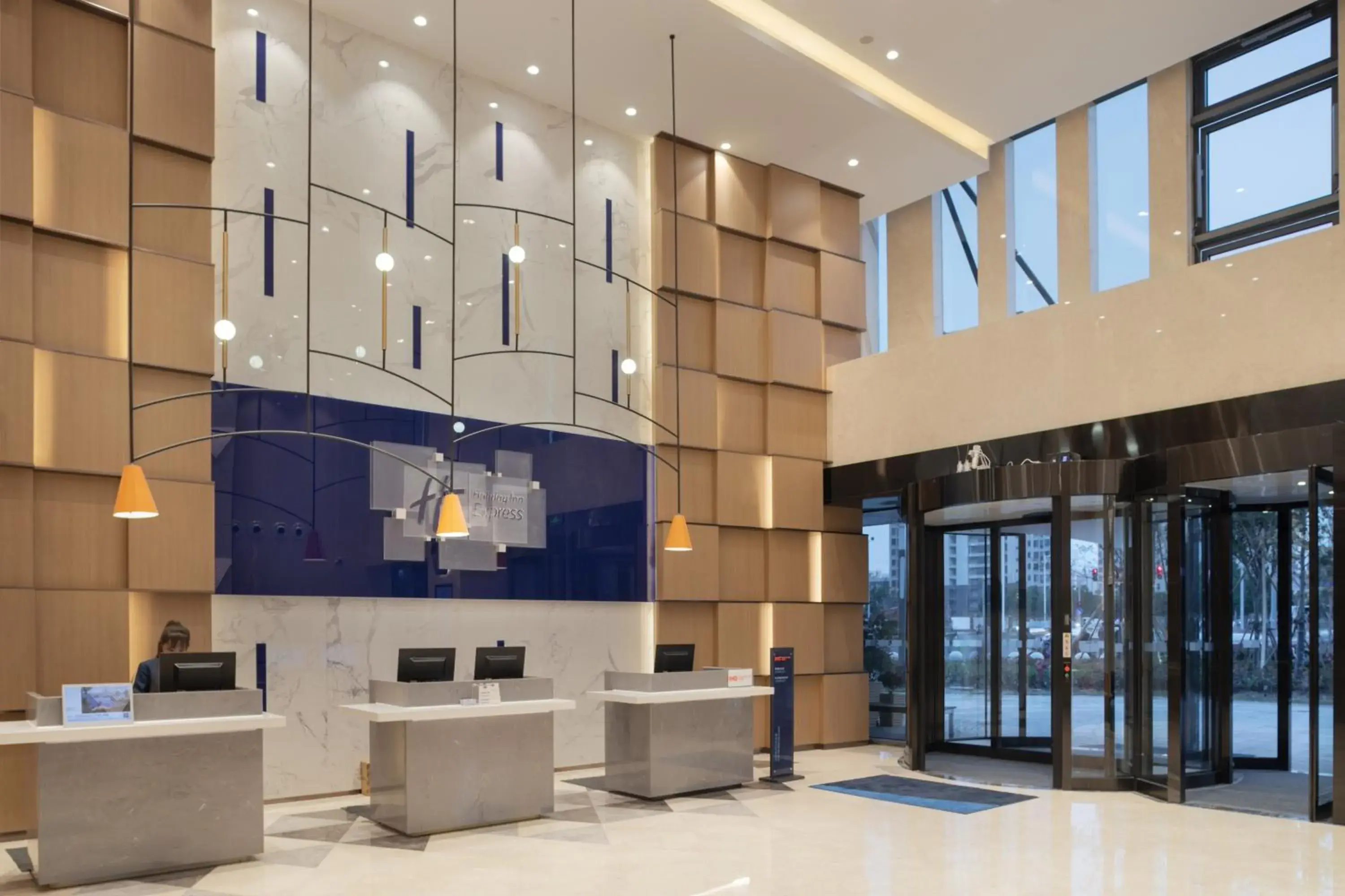 Lobby or reception in Holiday Inn Express Shanghai Huijin by IHG Lobby or reception in Holiday Inn Express Shanghai Huijin by IHG