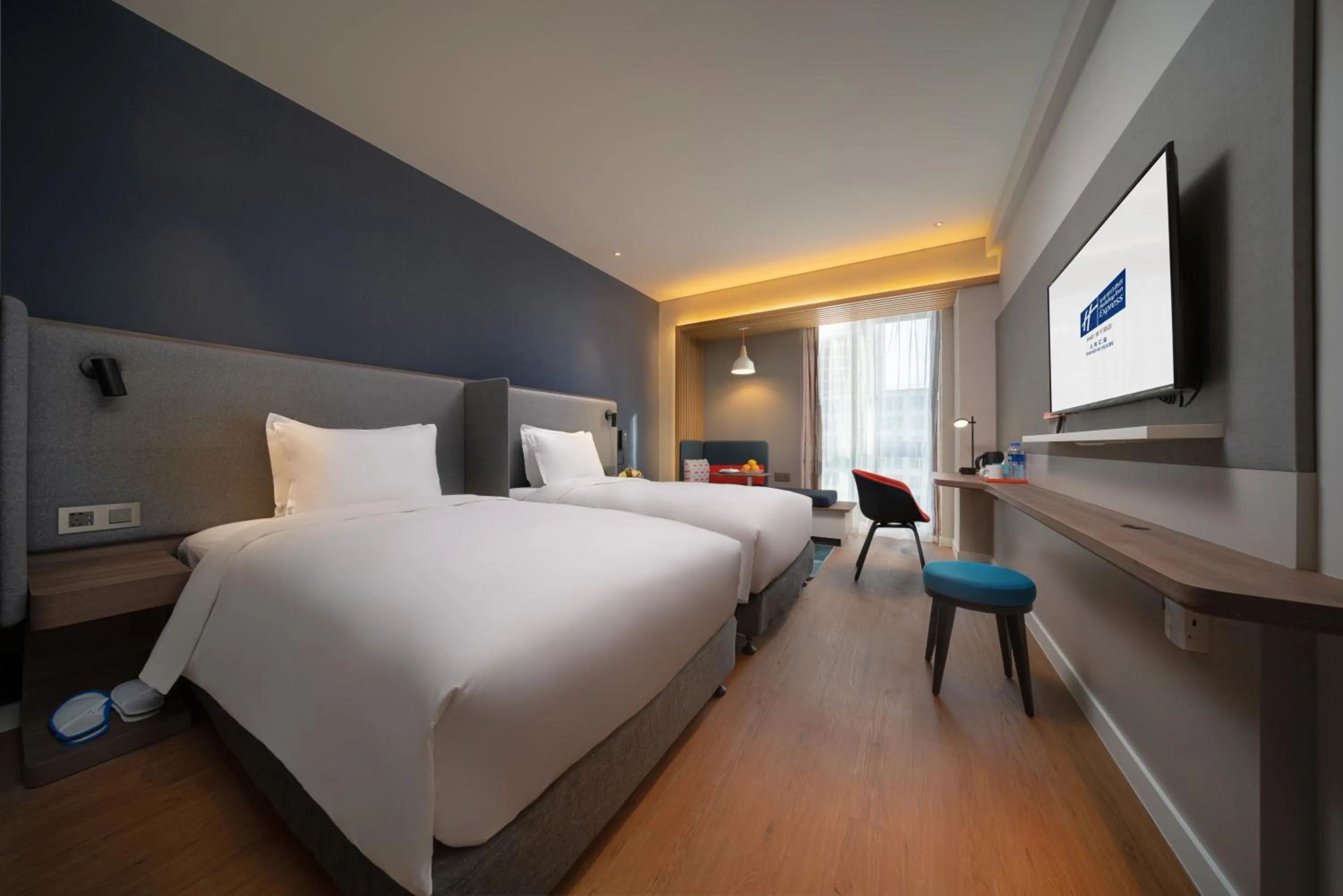 Bed in Holiday Inn Express Shanghai Huijin by IHG