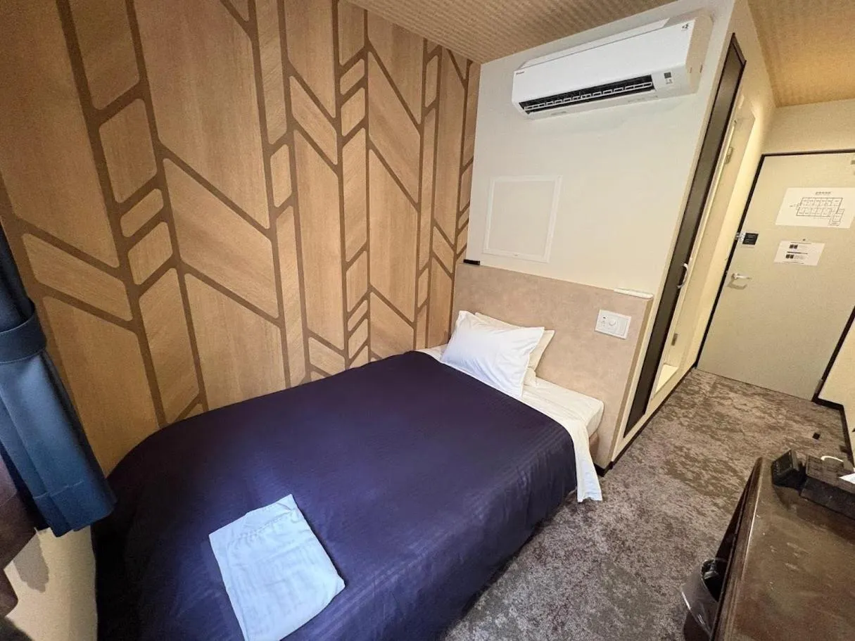 Bed in HOTEL LiVEMAX Himeji Ekimae