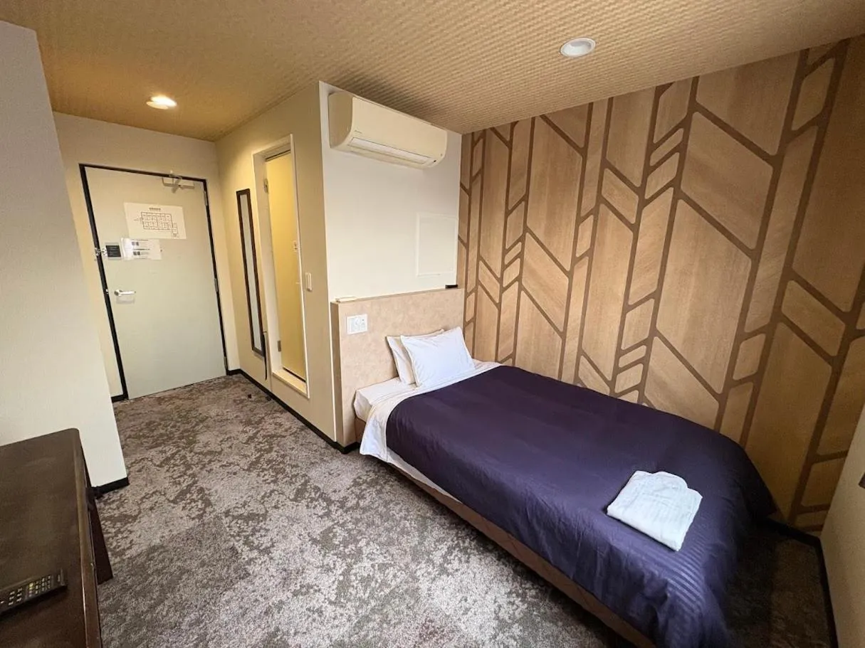 Bed in HOTEL LiVEMAX Himeji Ekimae