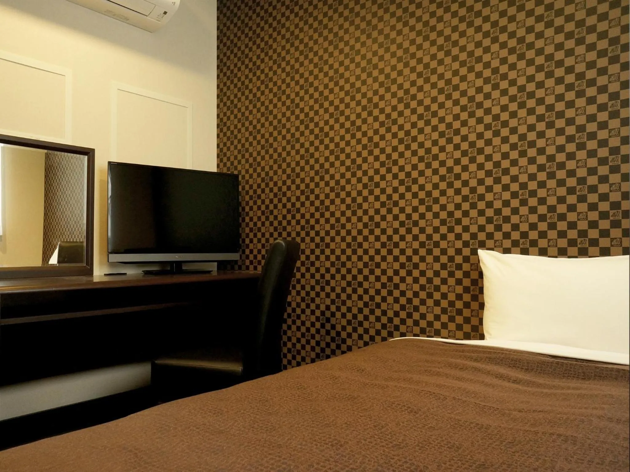 Decorative detail, Bed in HOTEL LiVEMAX Himeji Ekimae