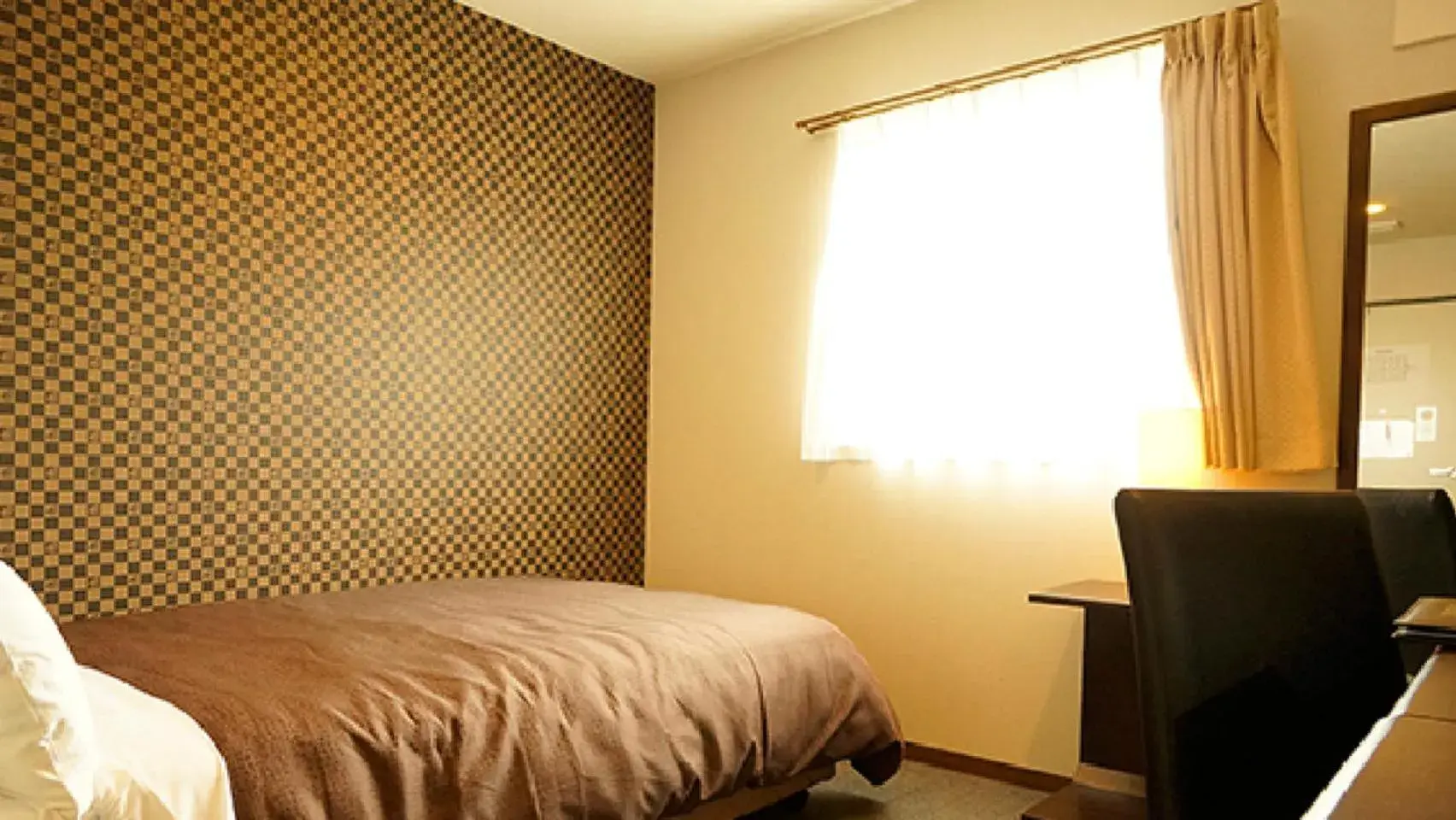 Bed in HOTEL LiVEMAX Himeji Ekimae Bed in HOTEL LiVEMAX Himeji Ekimae