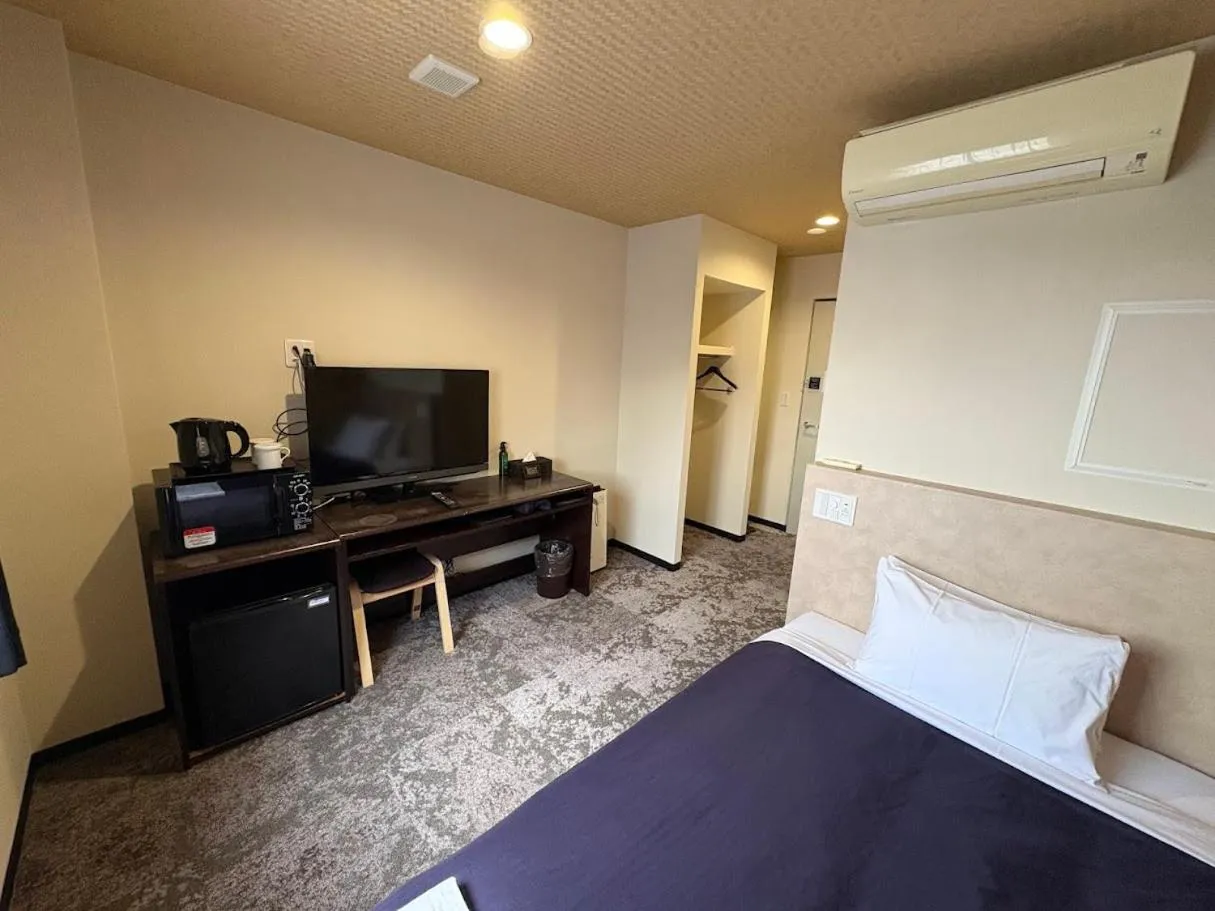 Bed in HOTEL LiVEMAX Himeji Ekimae