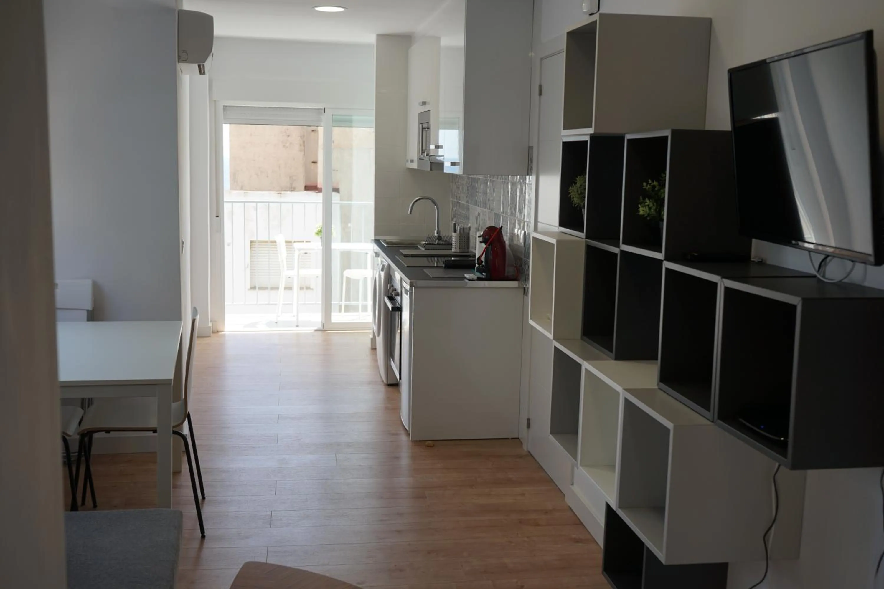 Kitchen or kitchenette in Pescadors Apartamentos TRG
