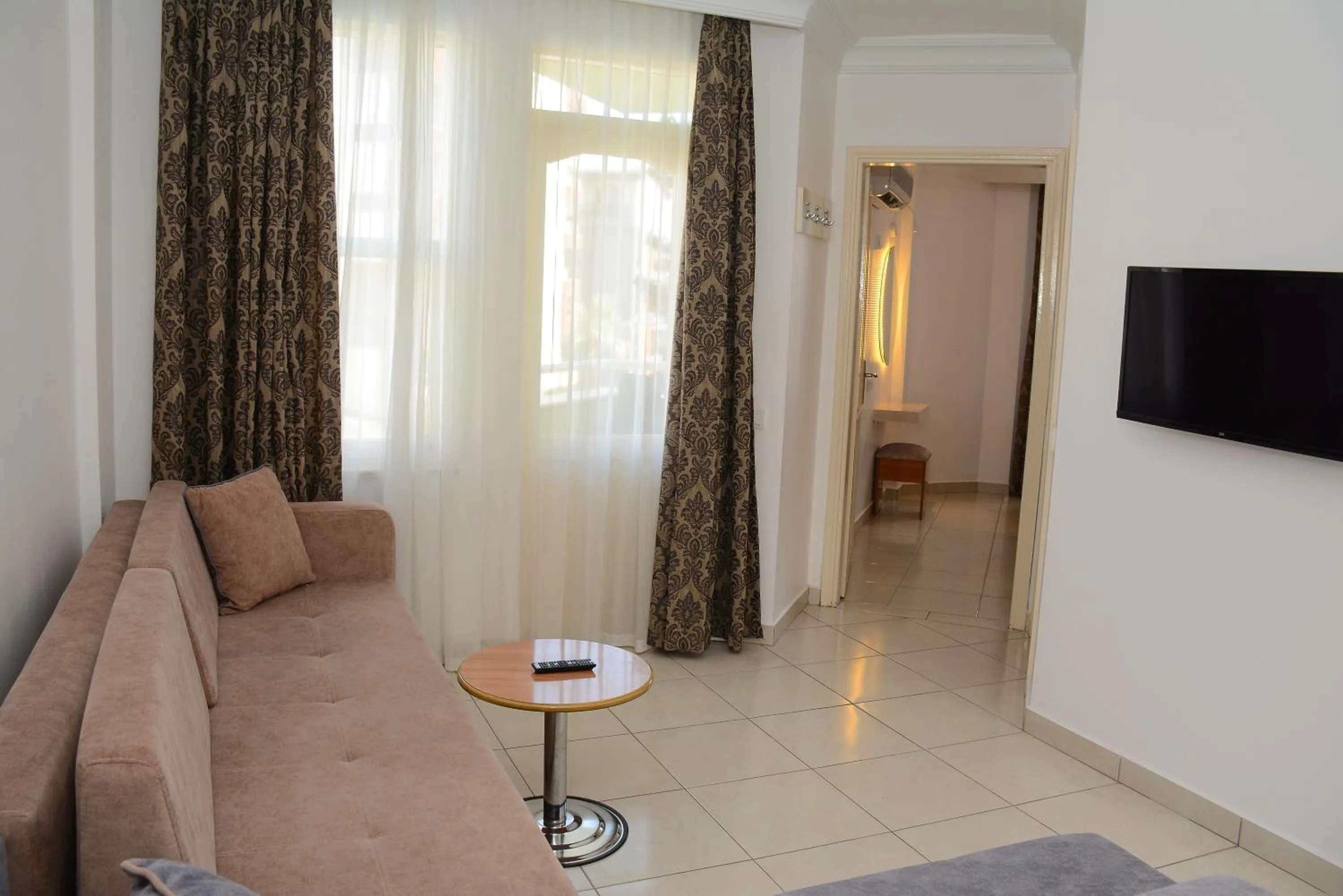 Living room in Almera Park Apart Hotel