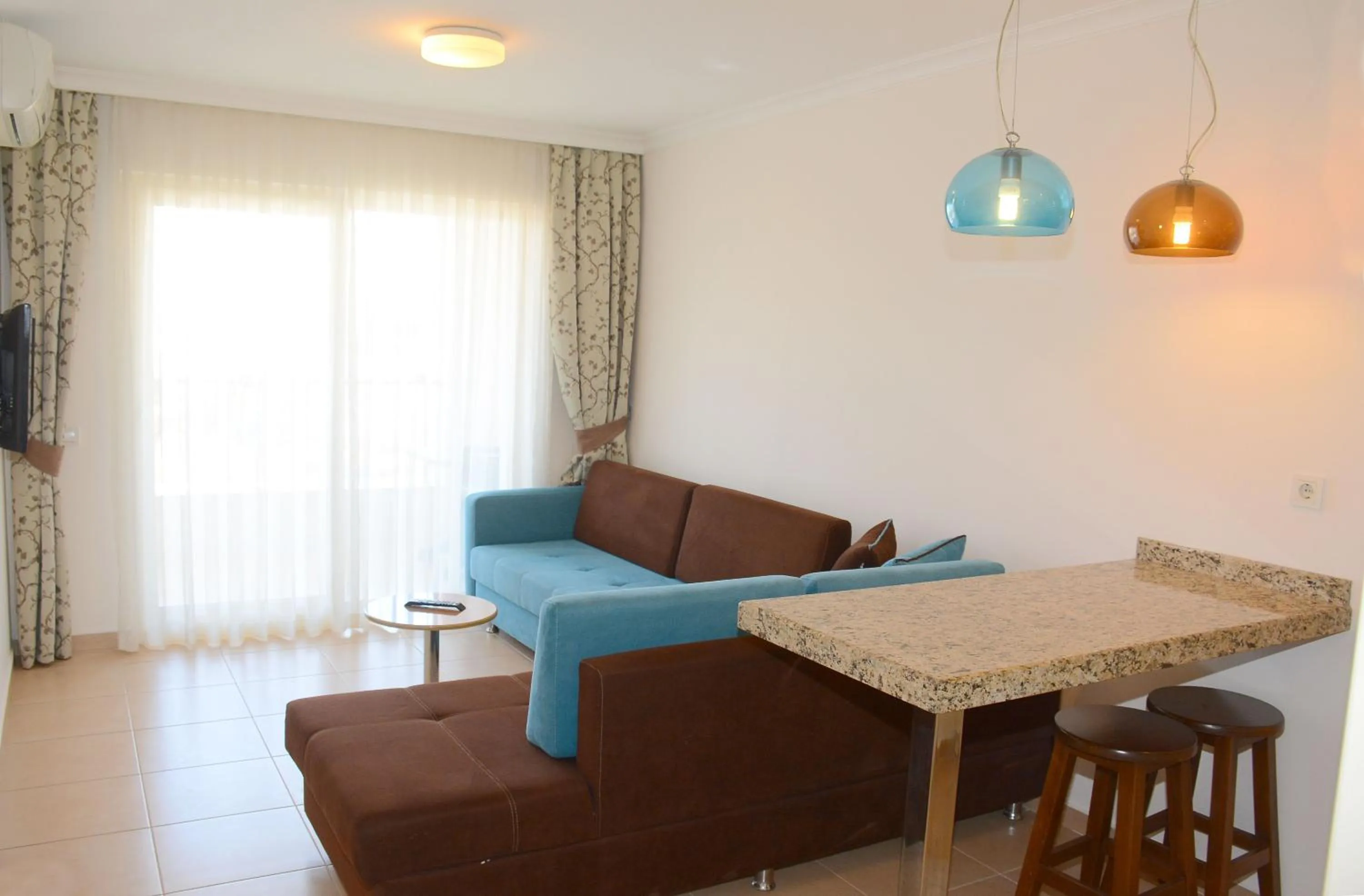 Living room in Almera Park Apart Hotel