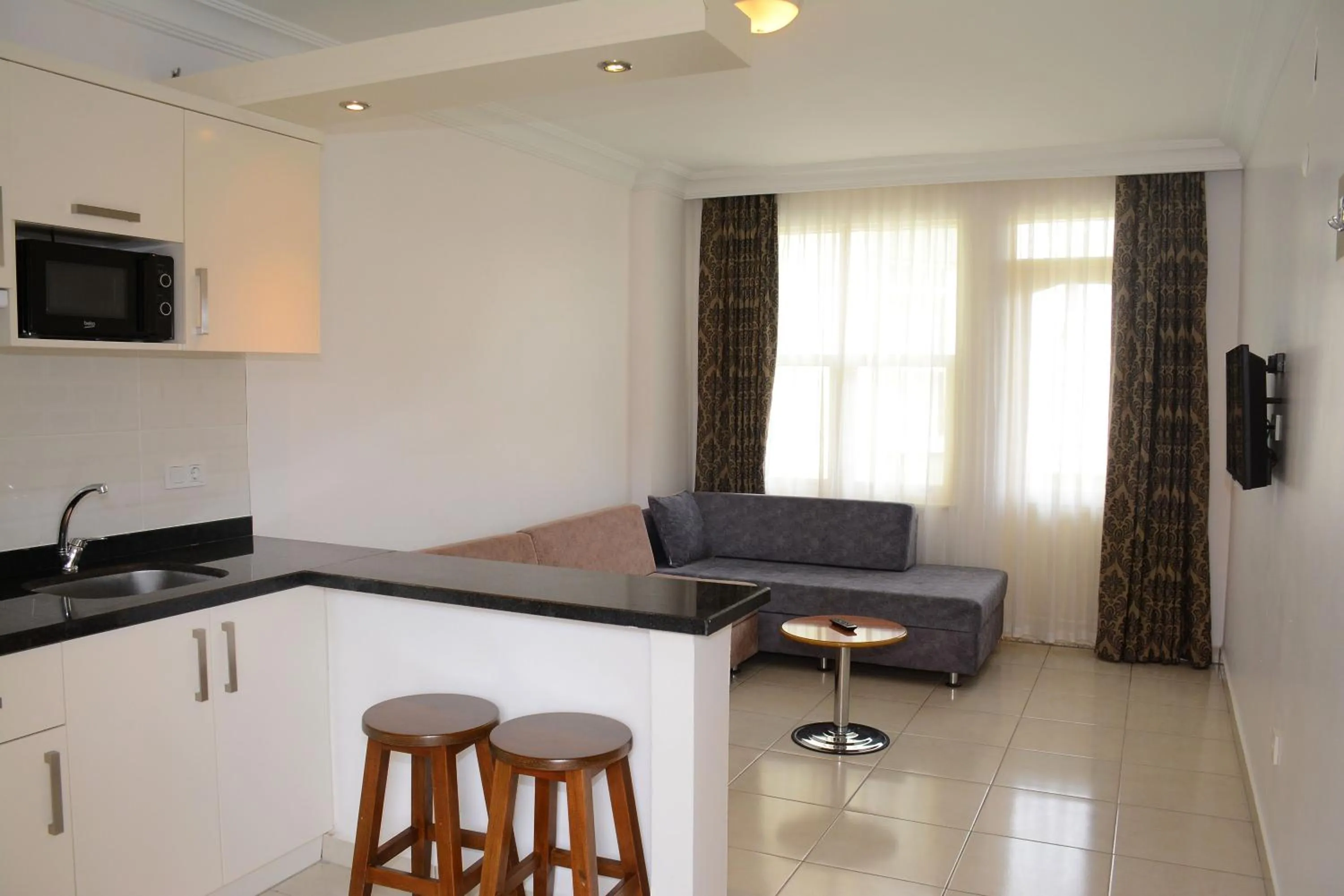 Living room in Almera Park Apart Hotel