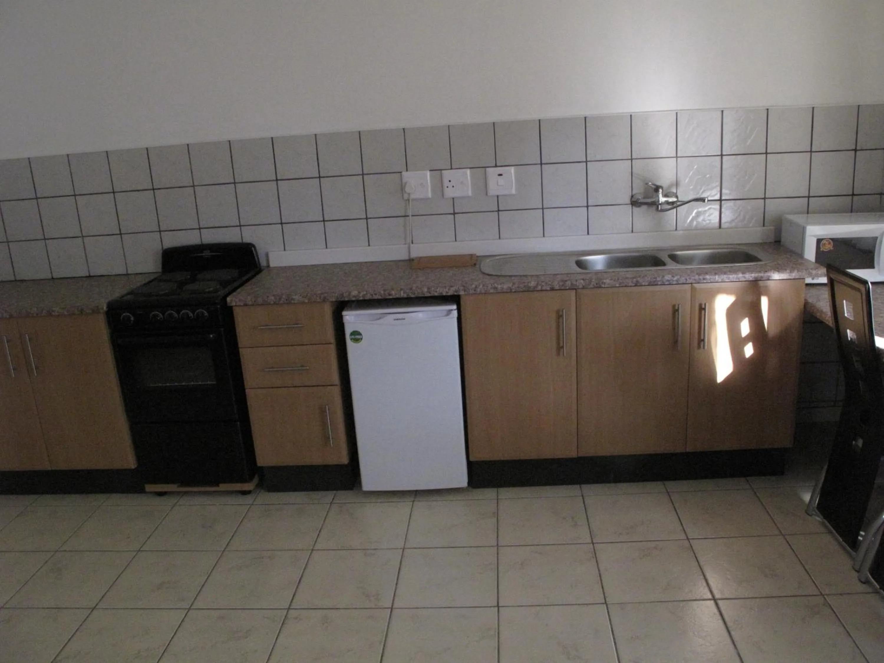 Kitchen or kitchenette in The Crescent Guesthouses - BnB/Self Catering