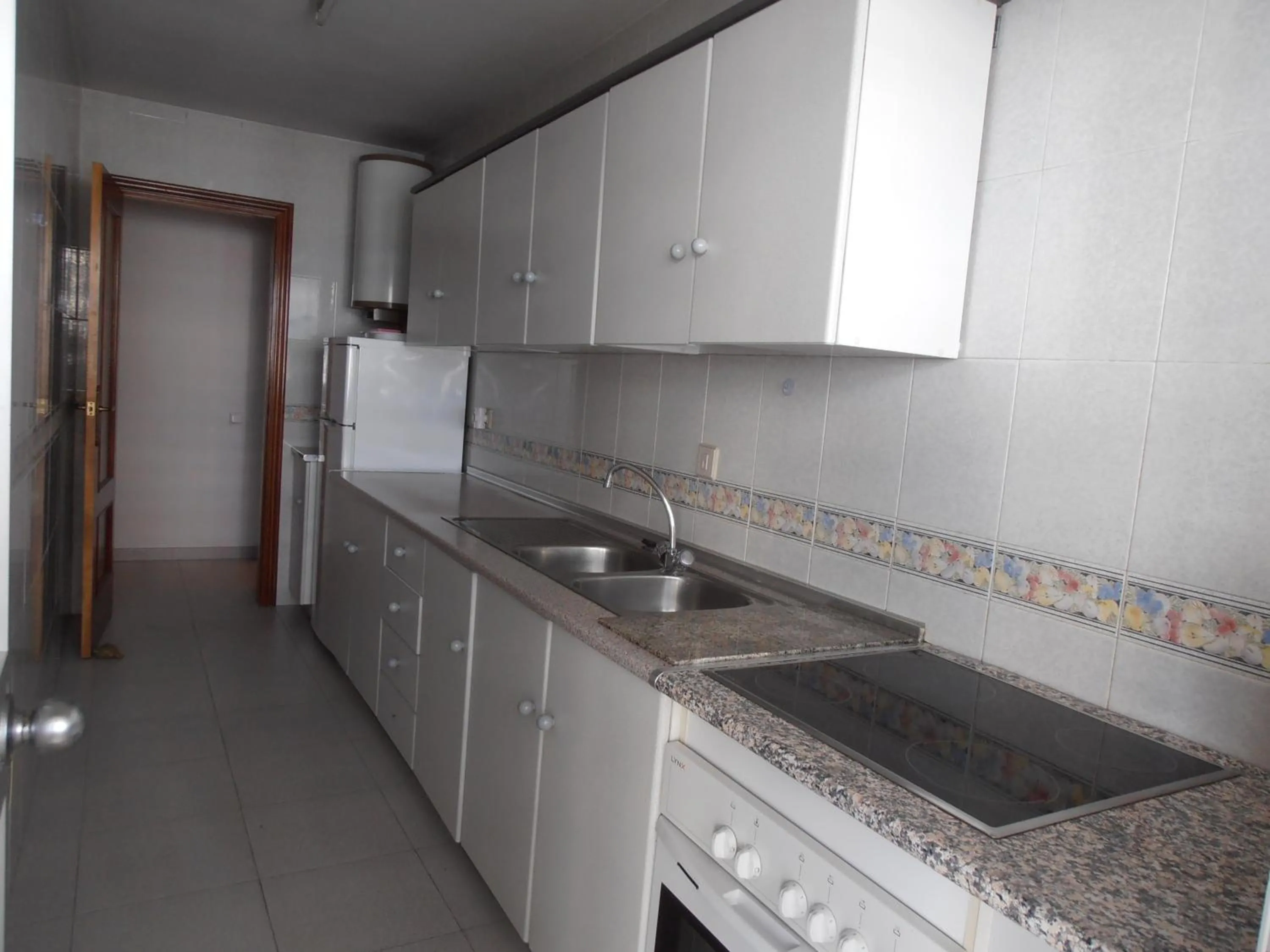 Kitchen or kitchenette in Apartamentos Mary