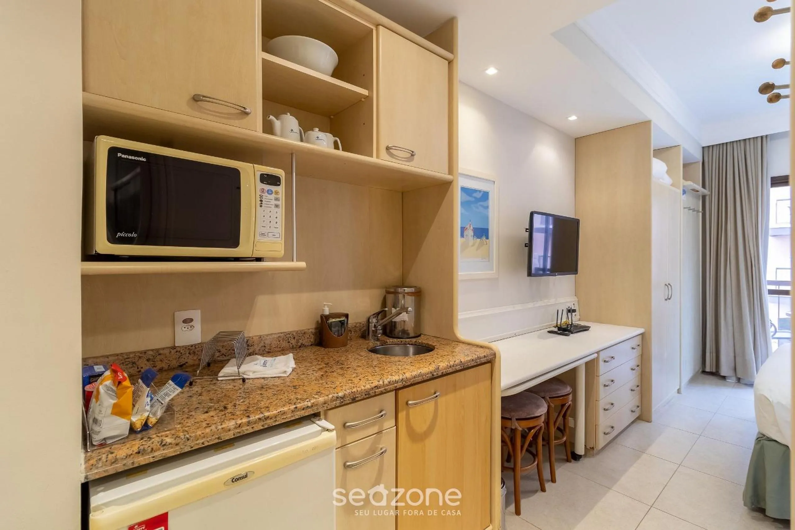 Kitchen or kitchenette in Estúdios Modernos em Resort pé na areia - Jurerê Beach Village JBVJR