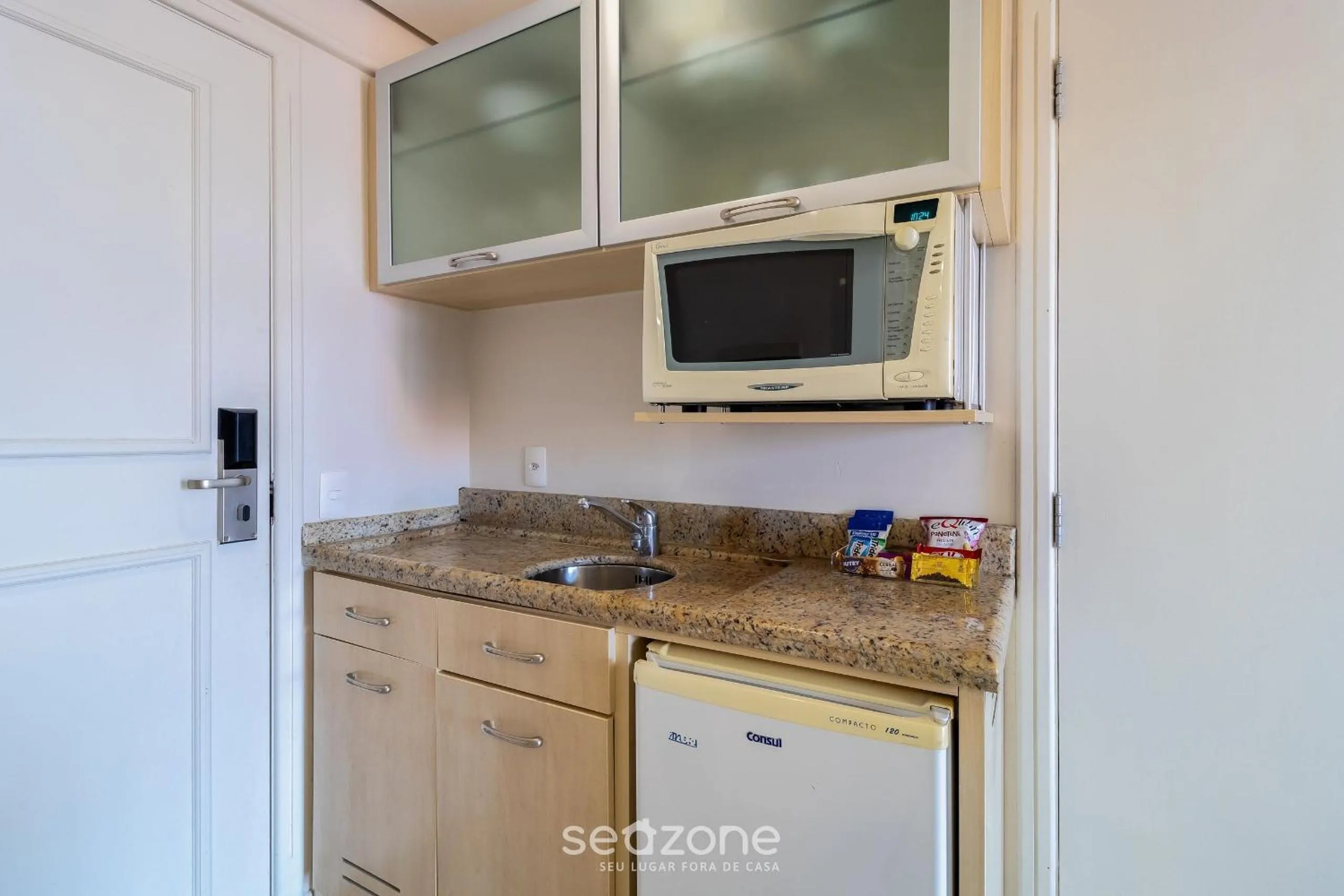 Kitchen or kitchenette in Estúdios Modernos em Resort pé na areia - Jurerê Beach Village JBVJR