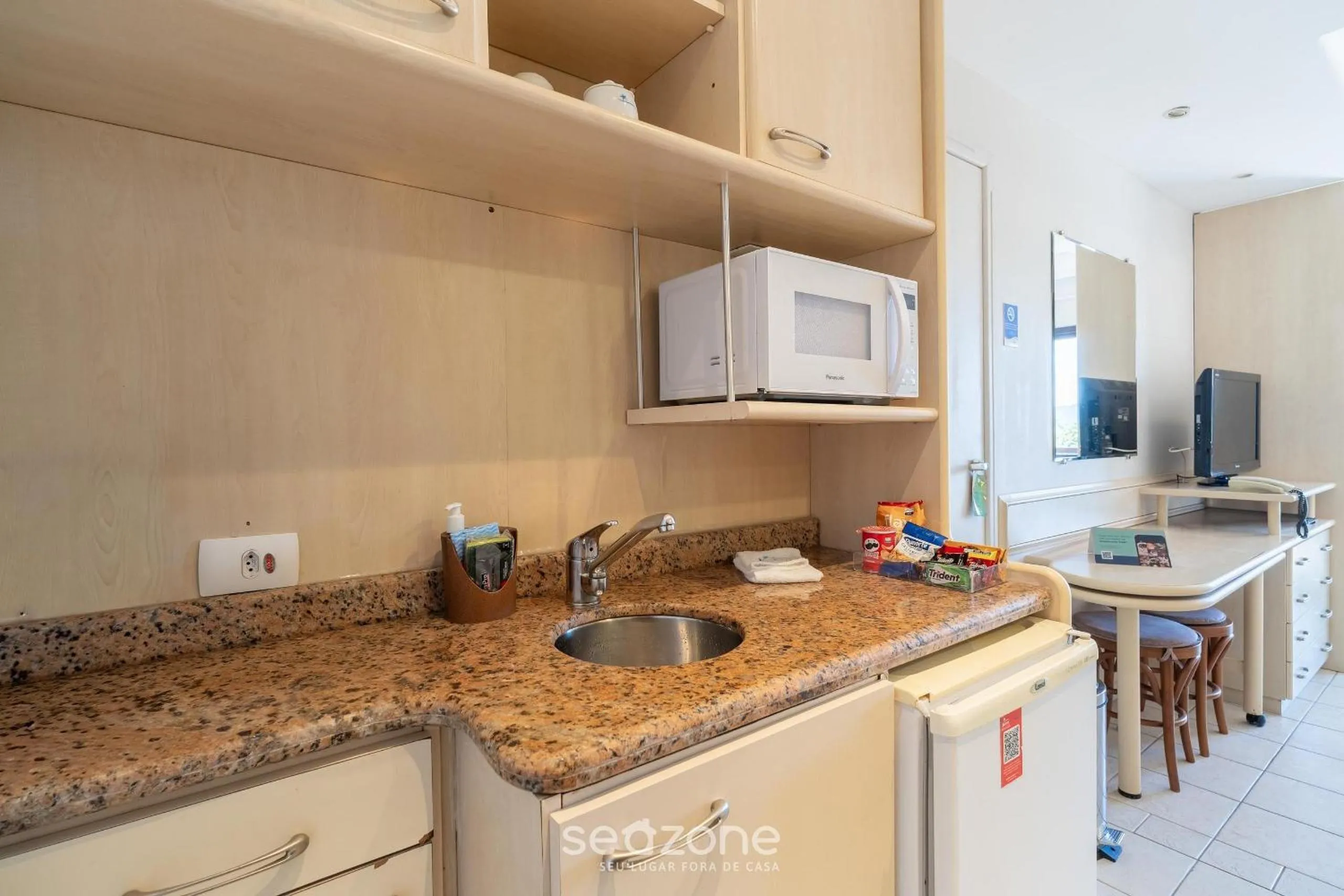 Kitchen or kitchenette in Estúdios Modernos em Resort pé na areia - Jurerê Beach Village JBVJR