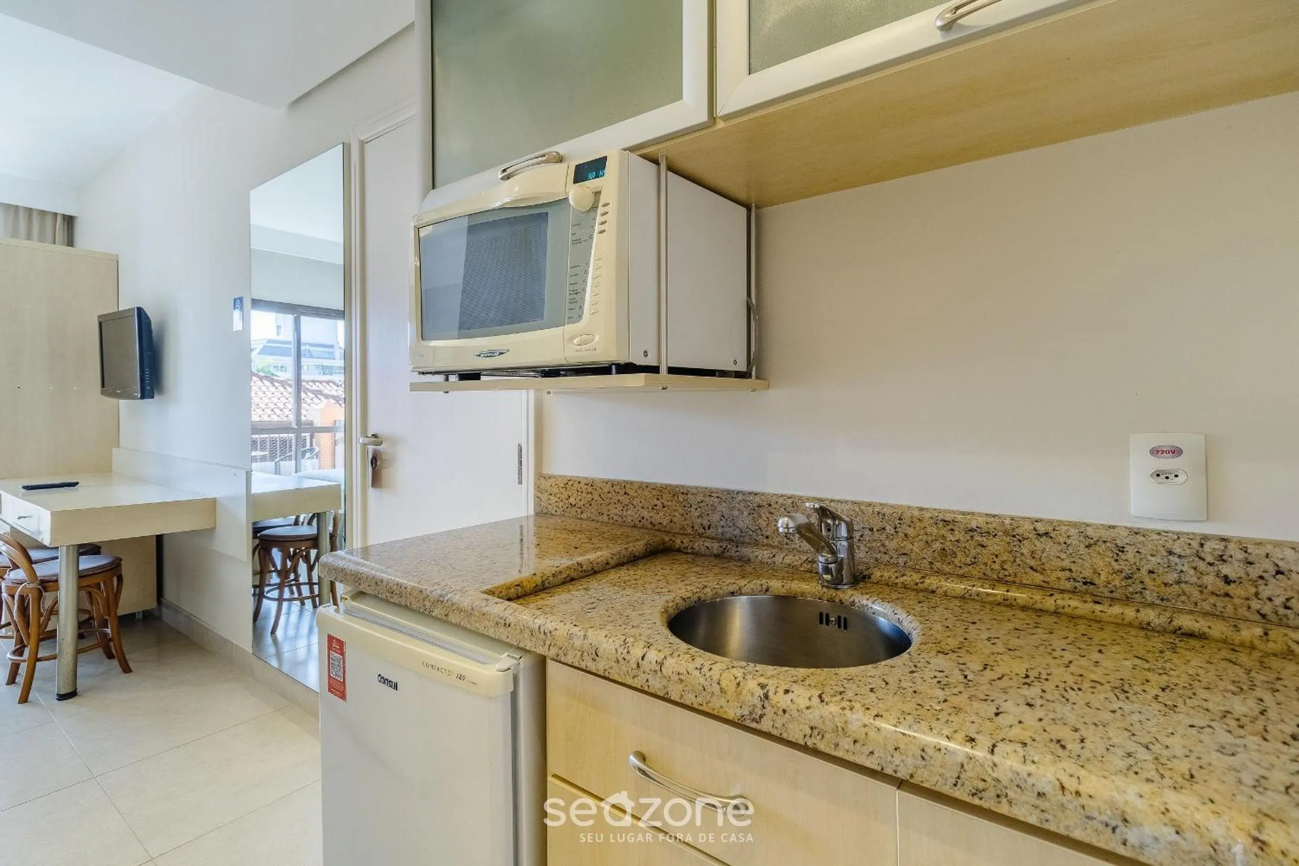 Kitchen or kitchenette in Estúdios Modernos em Resort pé na areia - Jurerê Beach Village JBVJR