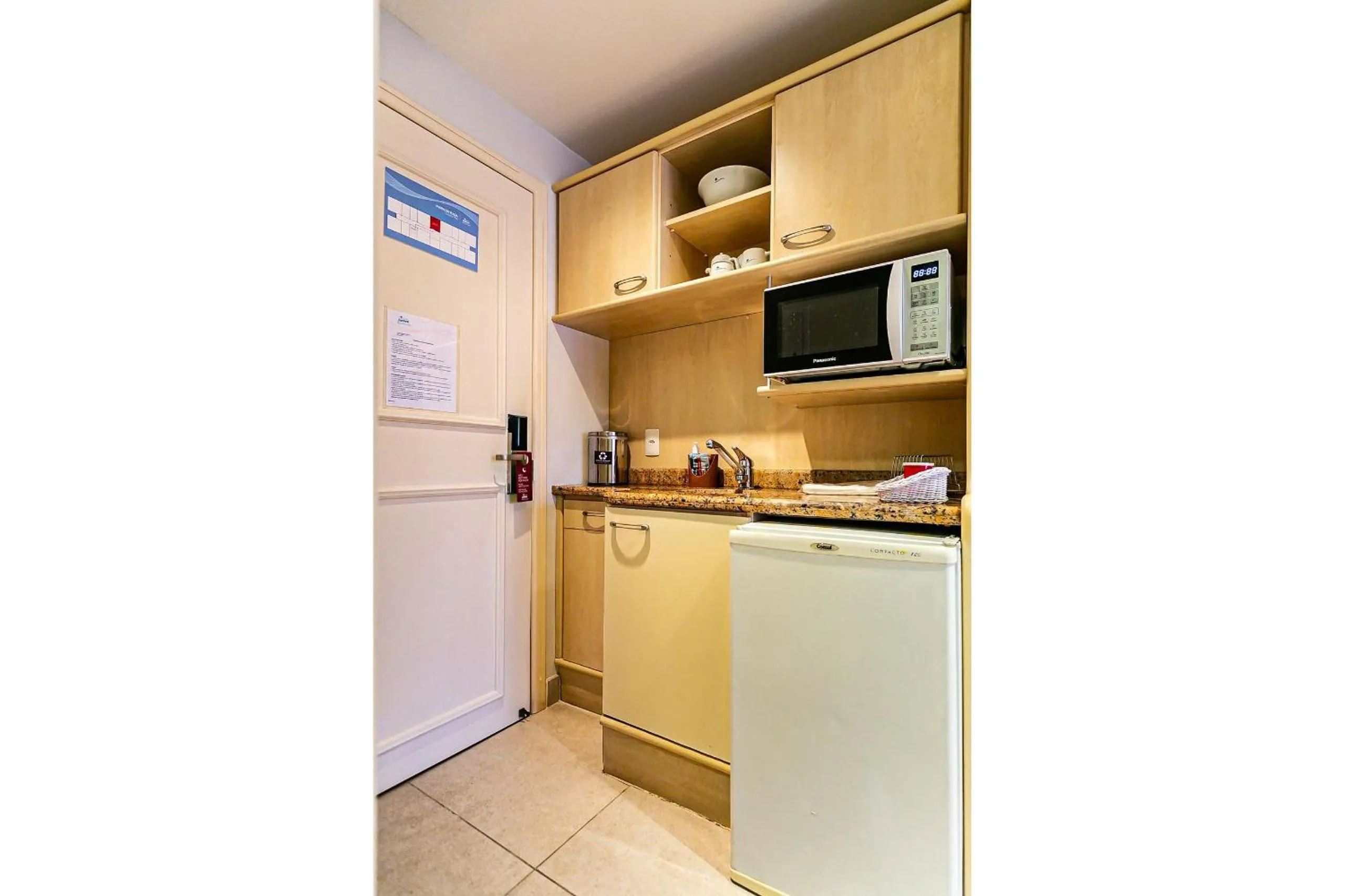 Kitchen or kitchenette in Estúdios Modernos em Resort pé na areia - Jurerê Beach Village JBVJR