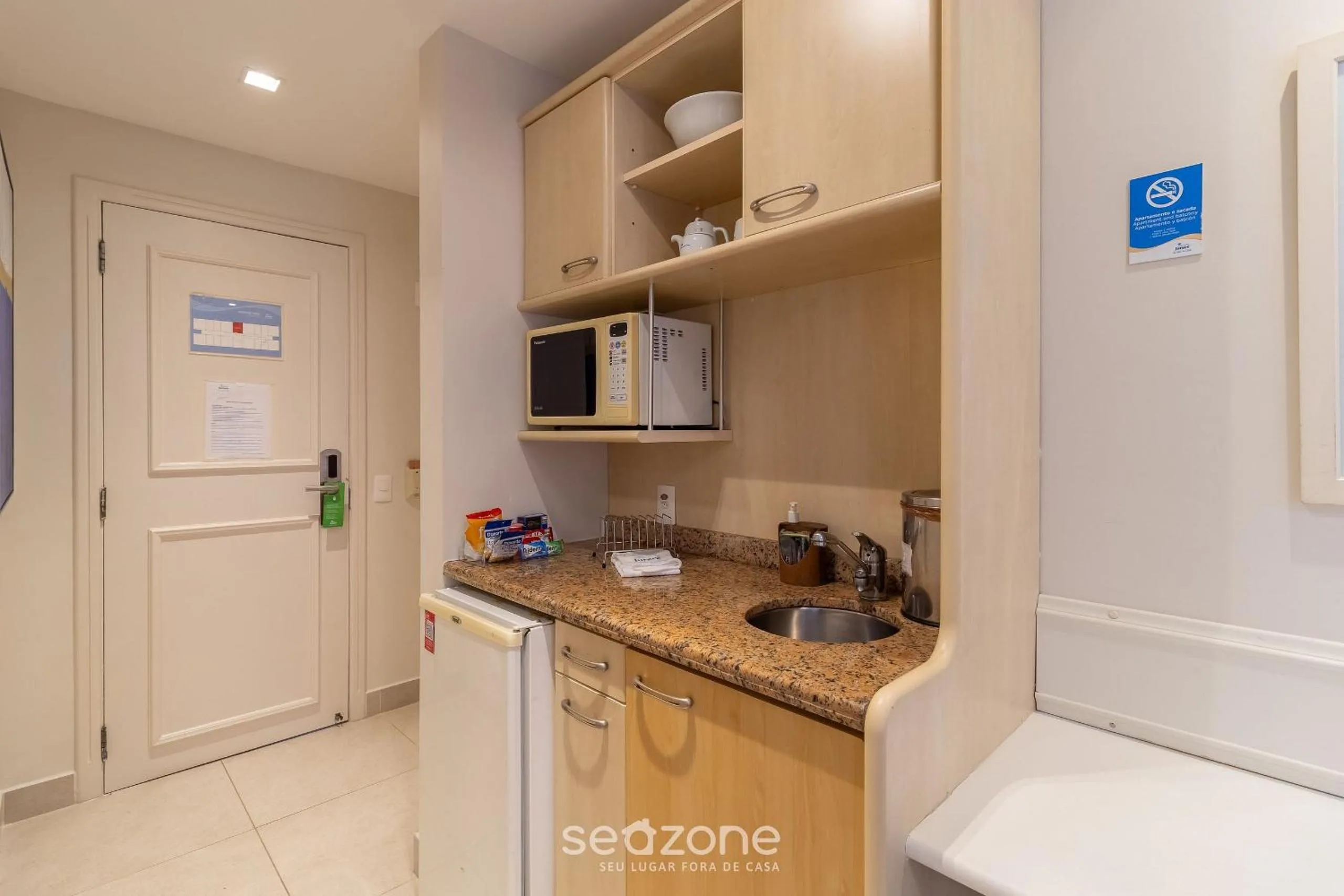 Kitchen or kitchenette in Estúdios Modernos em Resort pé na areia - Jurerê Beach Village JBVJR