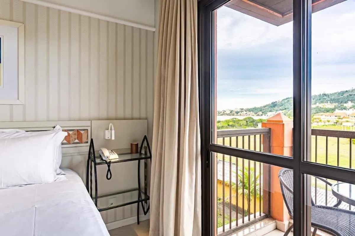 Bedroom, Bed in Estúdios Modernos em Resort pé na areia - Jurerê Beach Village JBVJR