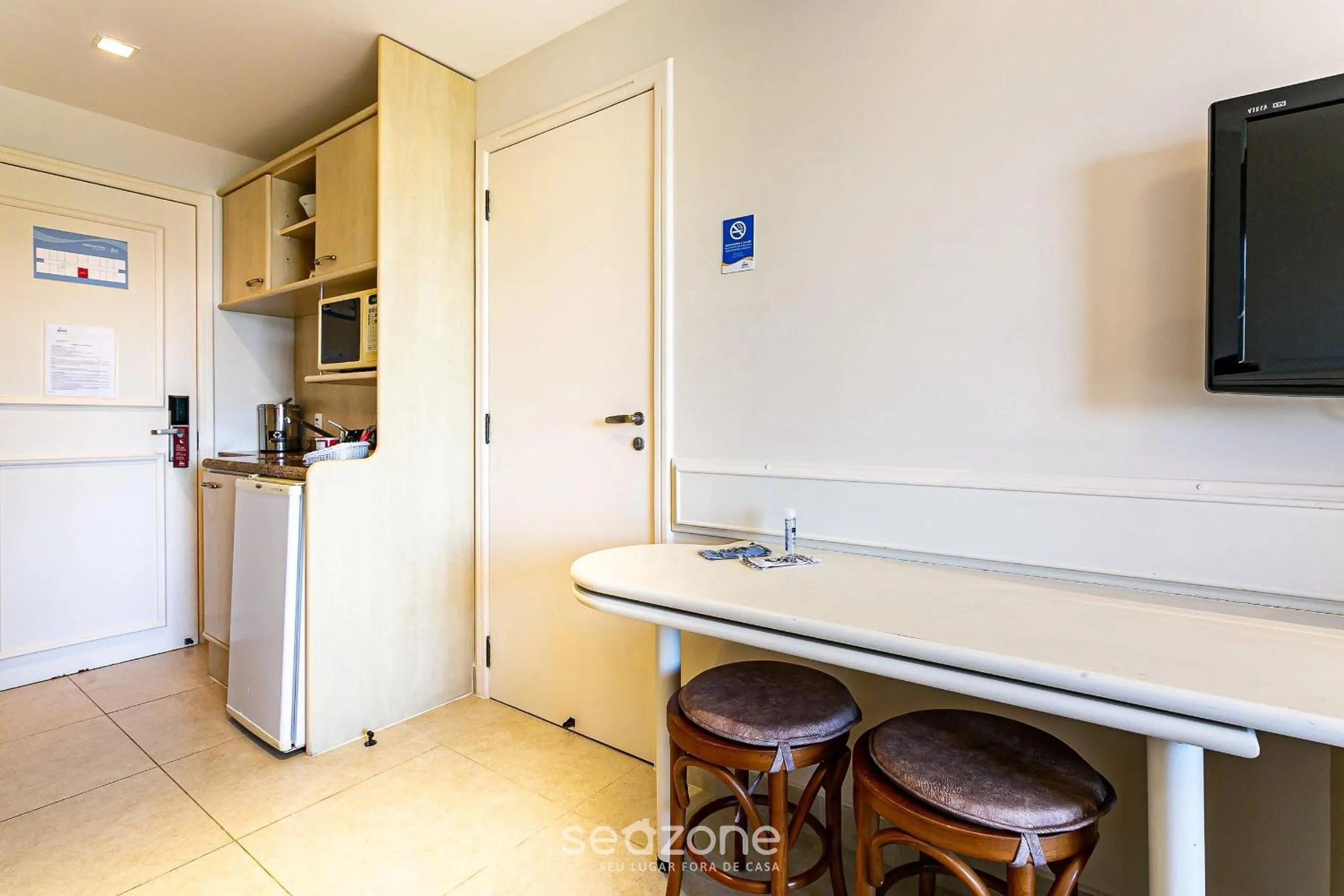 Kitchen or kitchenette in Estúdios Modernos em Resort pé na areia - Jurerê Beach Village JBVJR