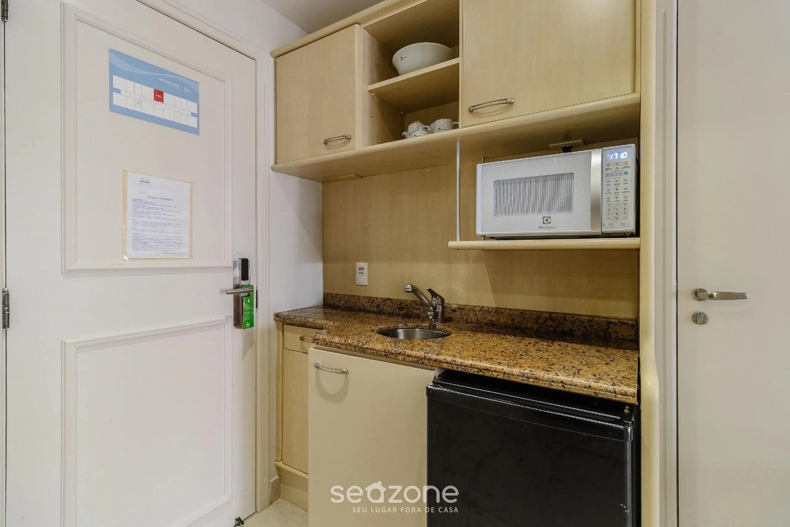 Kitchen or kitchenette in Estúdios Modernos em Resort pé na areia - Jurerê Beach Village JBVJR