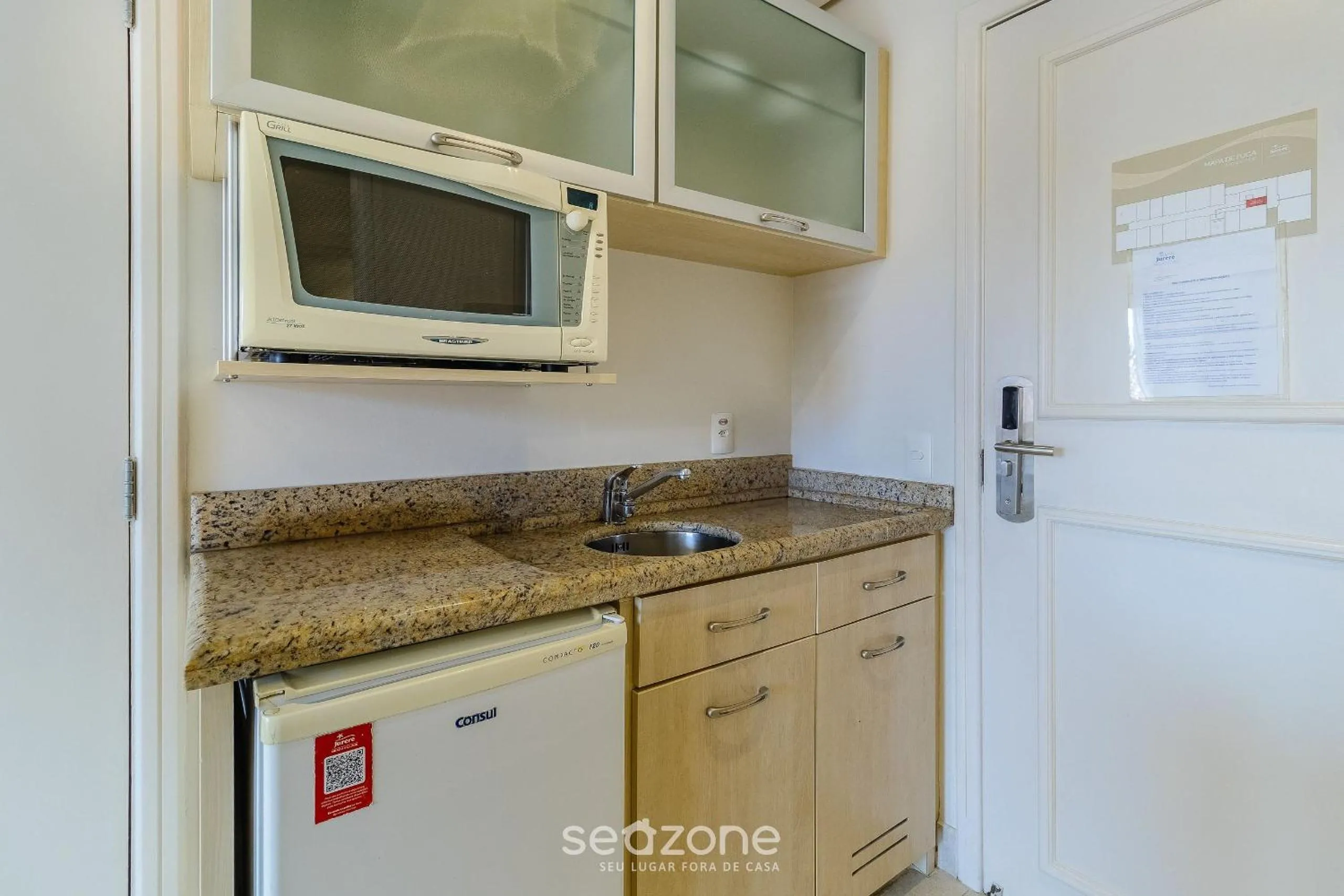Kitchen or kitchenette in Estúdios Modernos em Resort pé na areia - Jurerê Beach Village JBVJR