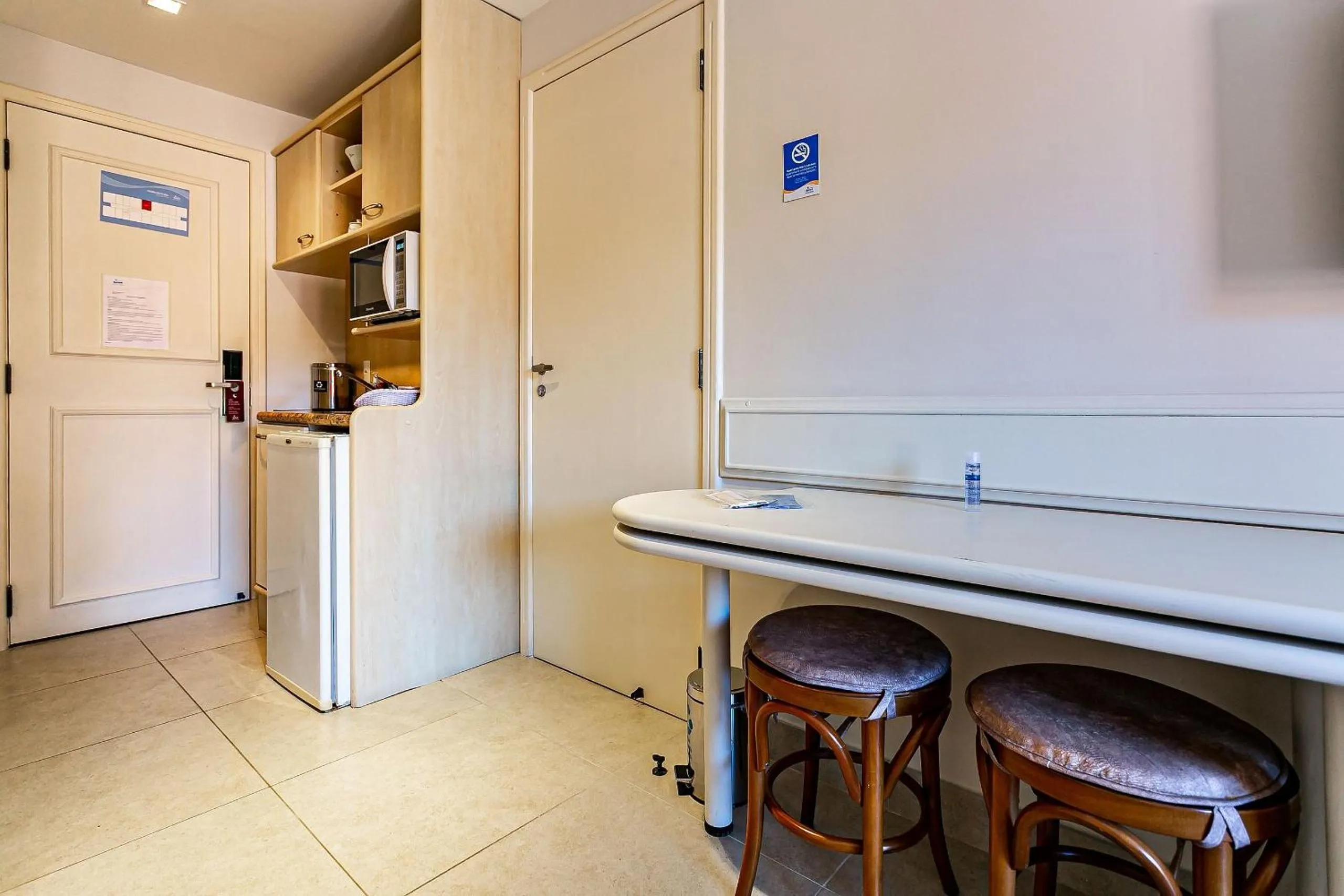Kitchen or kitchenette in Estúdios Modernos em Resort pé na areia - Jurerê Beach Village JBVJR