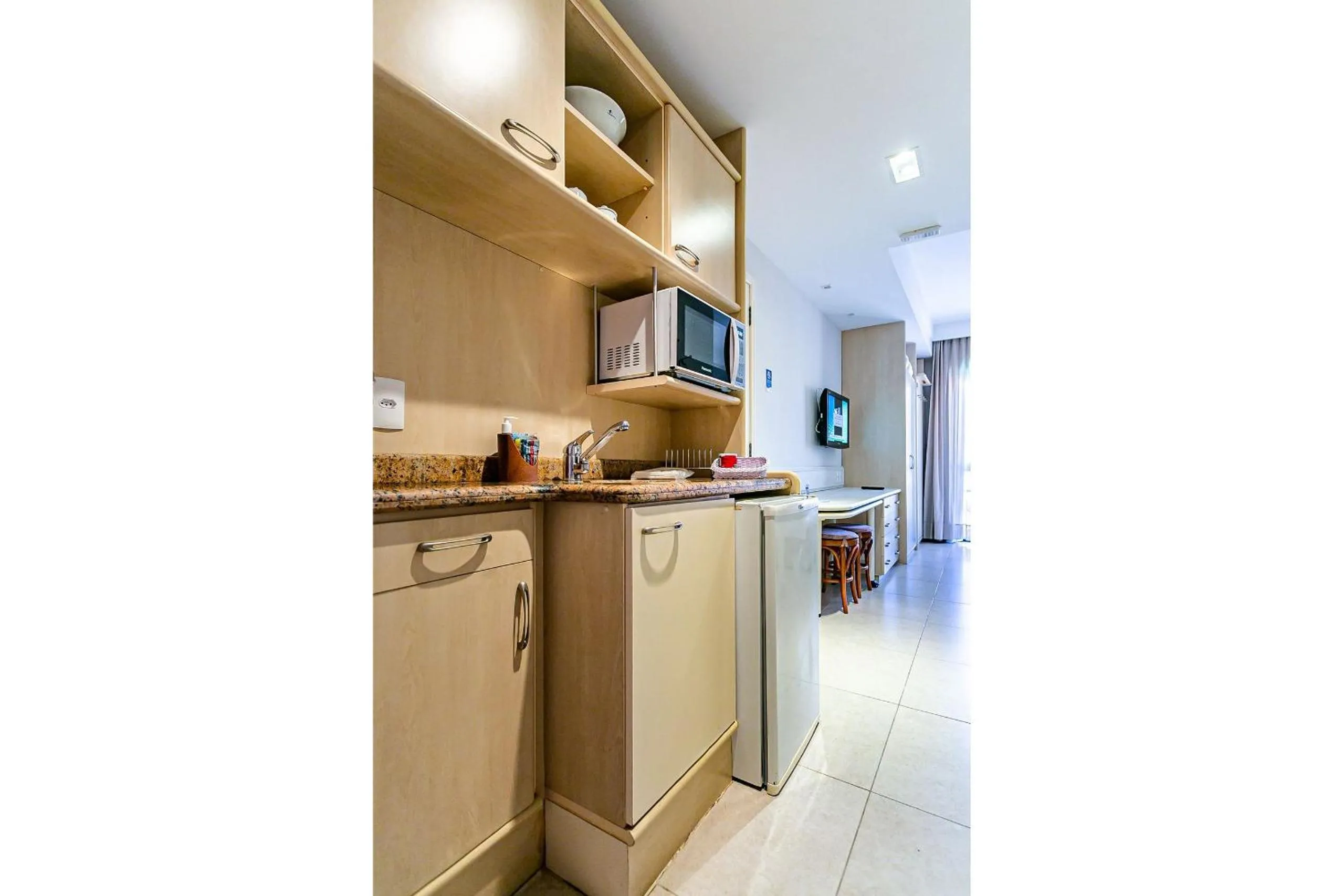 Kitchen or kitchenette in Estúdios Modernos em Resort pé na areia - Jurerê Beach Village JBVJR