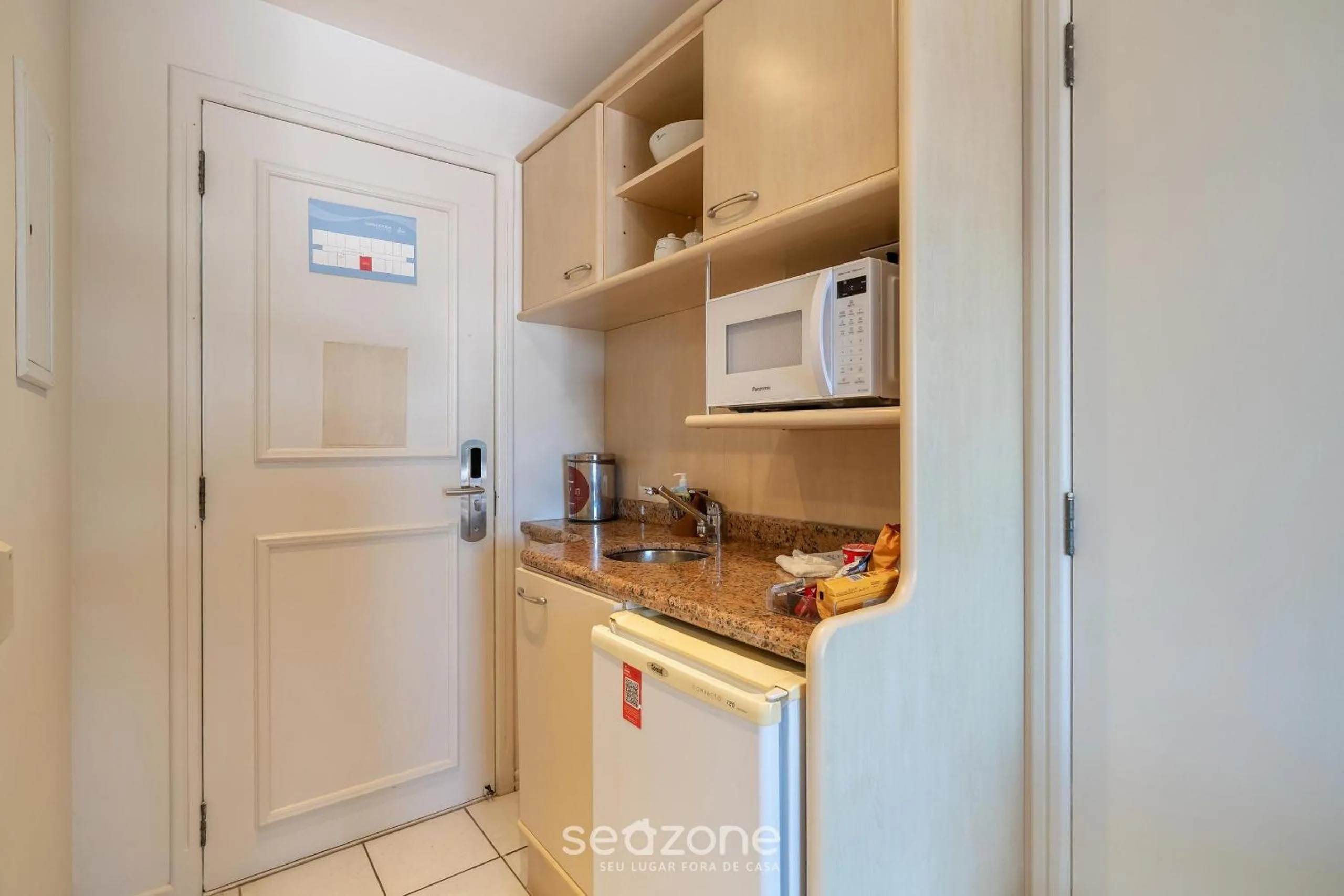 Kitchen or kitchenette in Estúdios Modernos em Resort pé na areia - Jurerê Beach Village JBVJR