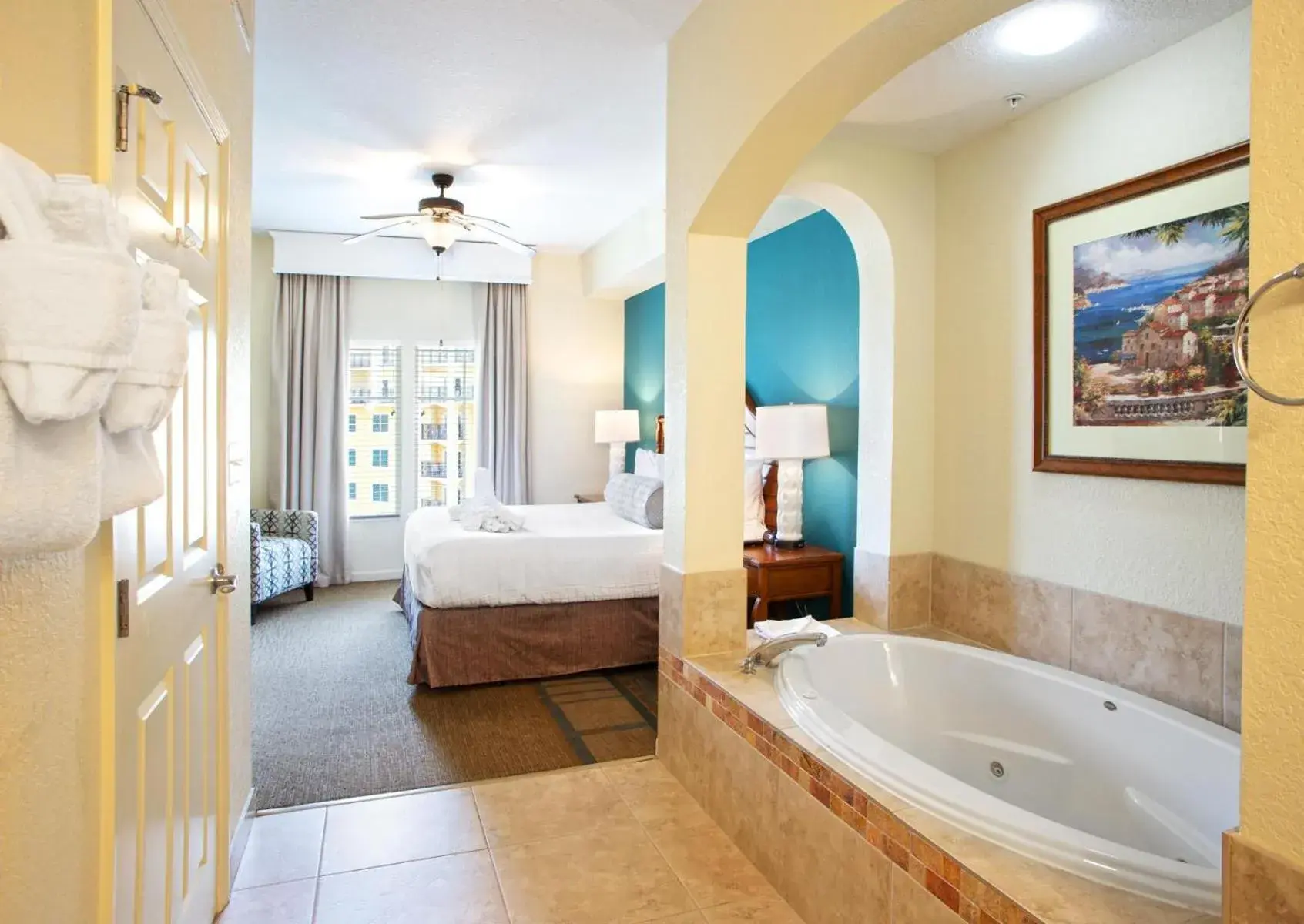 Bathroom, Bed in Lake Buena Vista Resort Village and Spa, Near Disney Bathroom, Bed in Lake Buena Vista Resort Village and Spa, Near Disney
