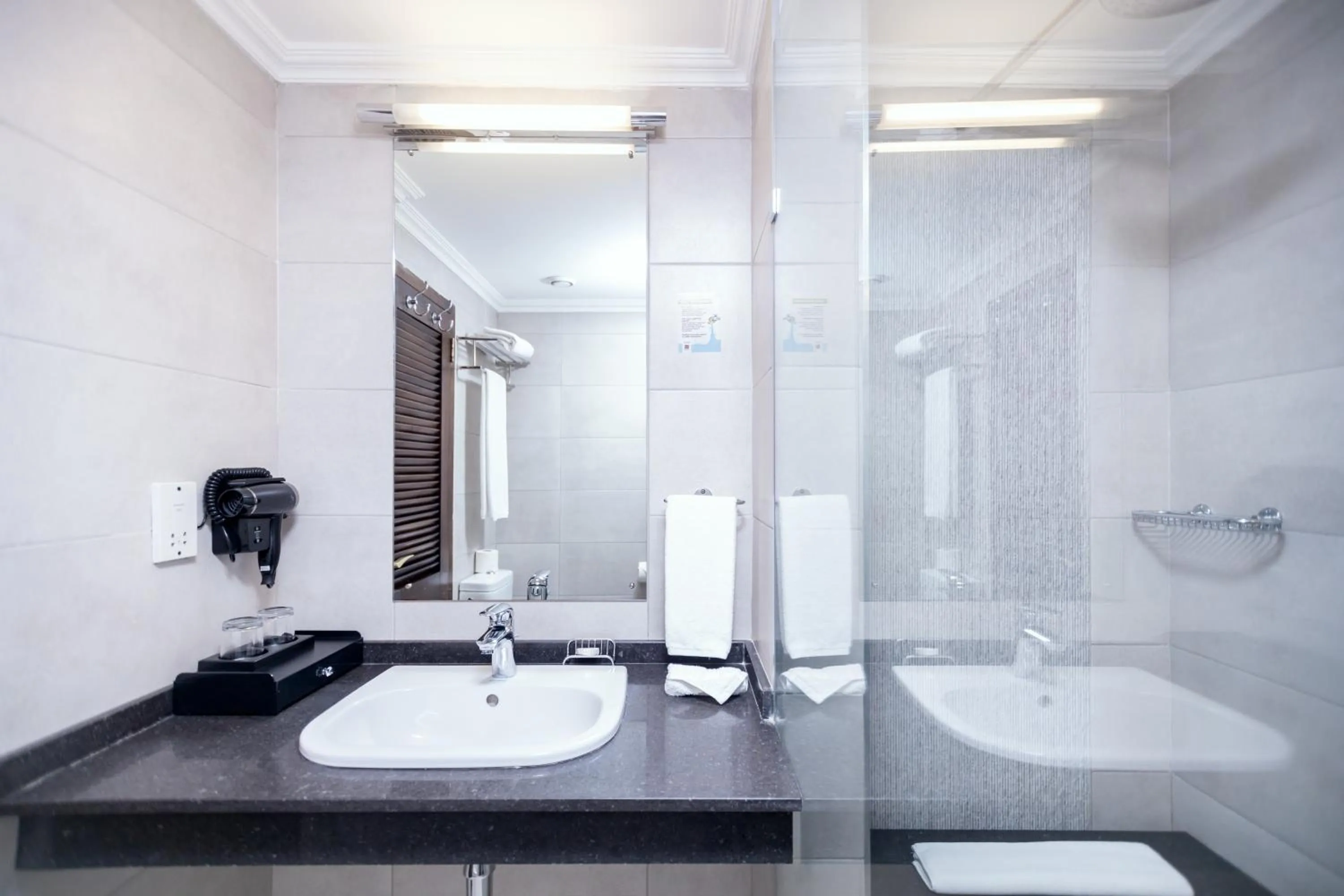 Bathroom in The African Regent Hotel