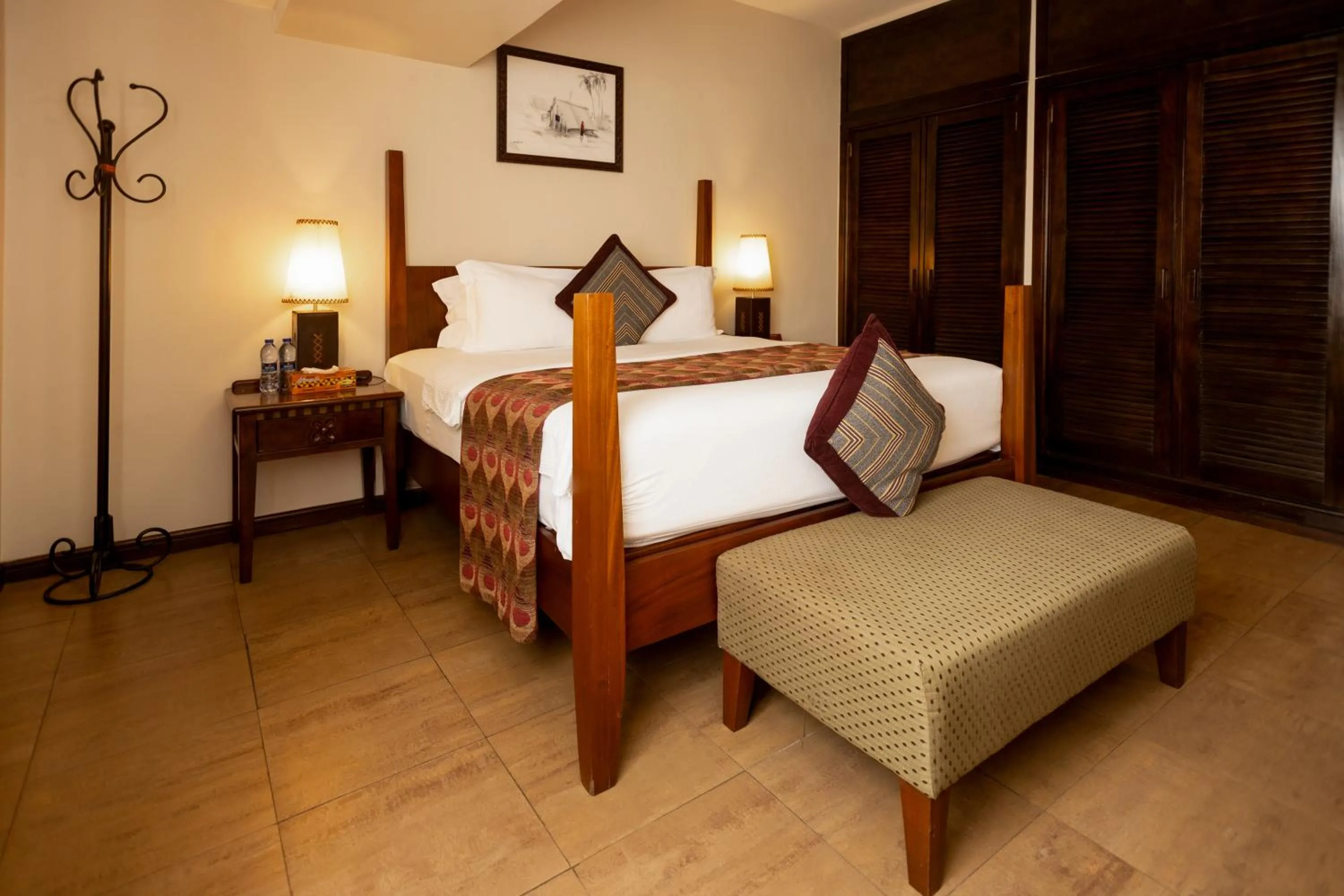 Bed in The African Regent Hotel