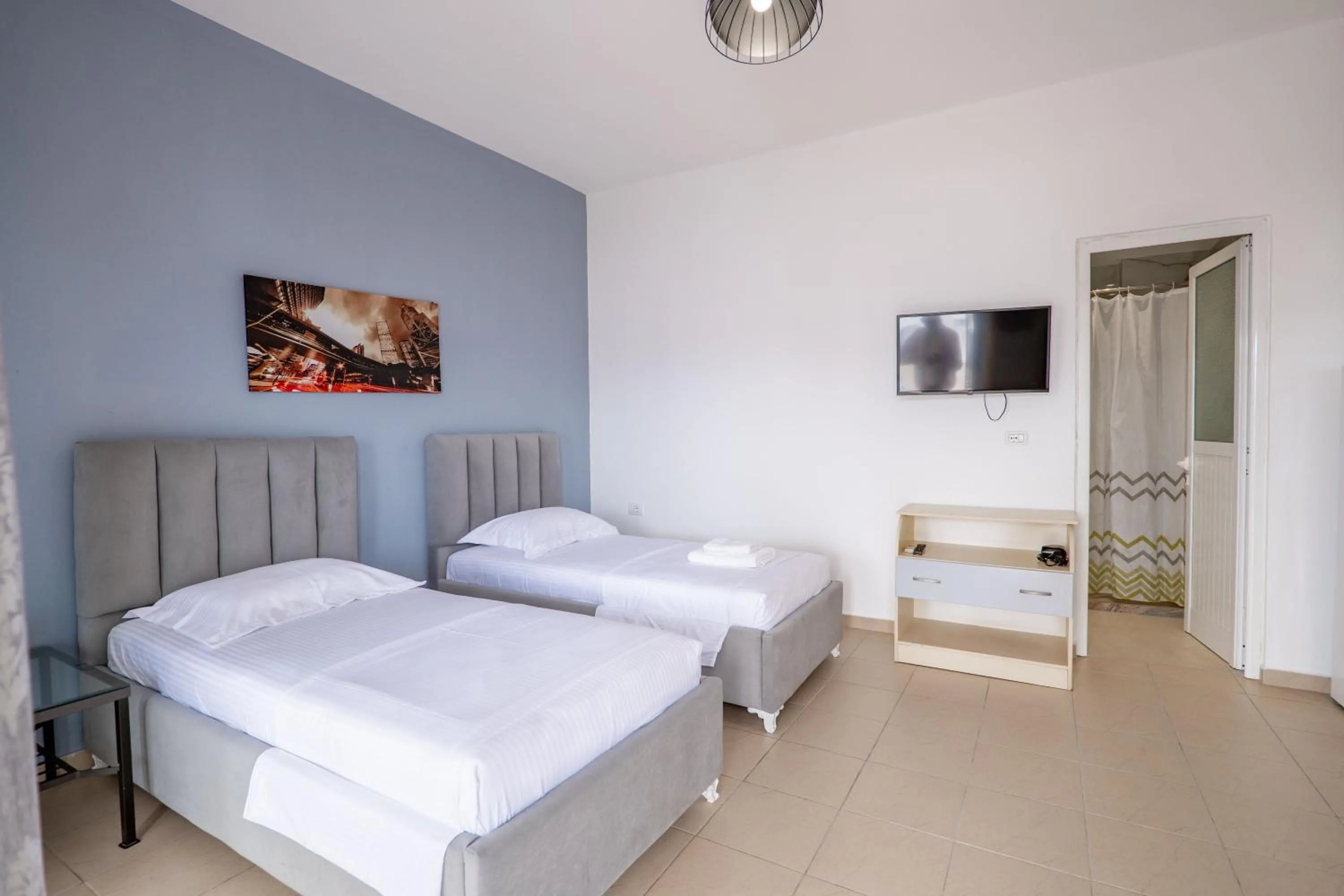 Photo of the whole room, Bed in Gregory's Apartments