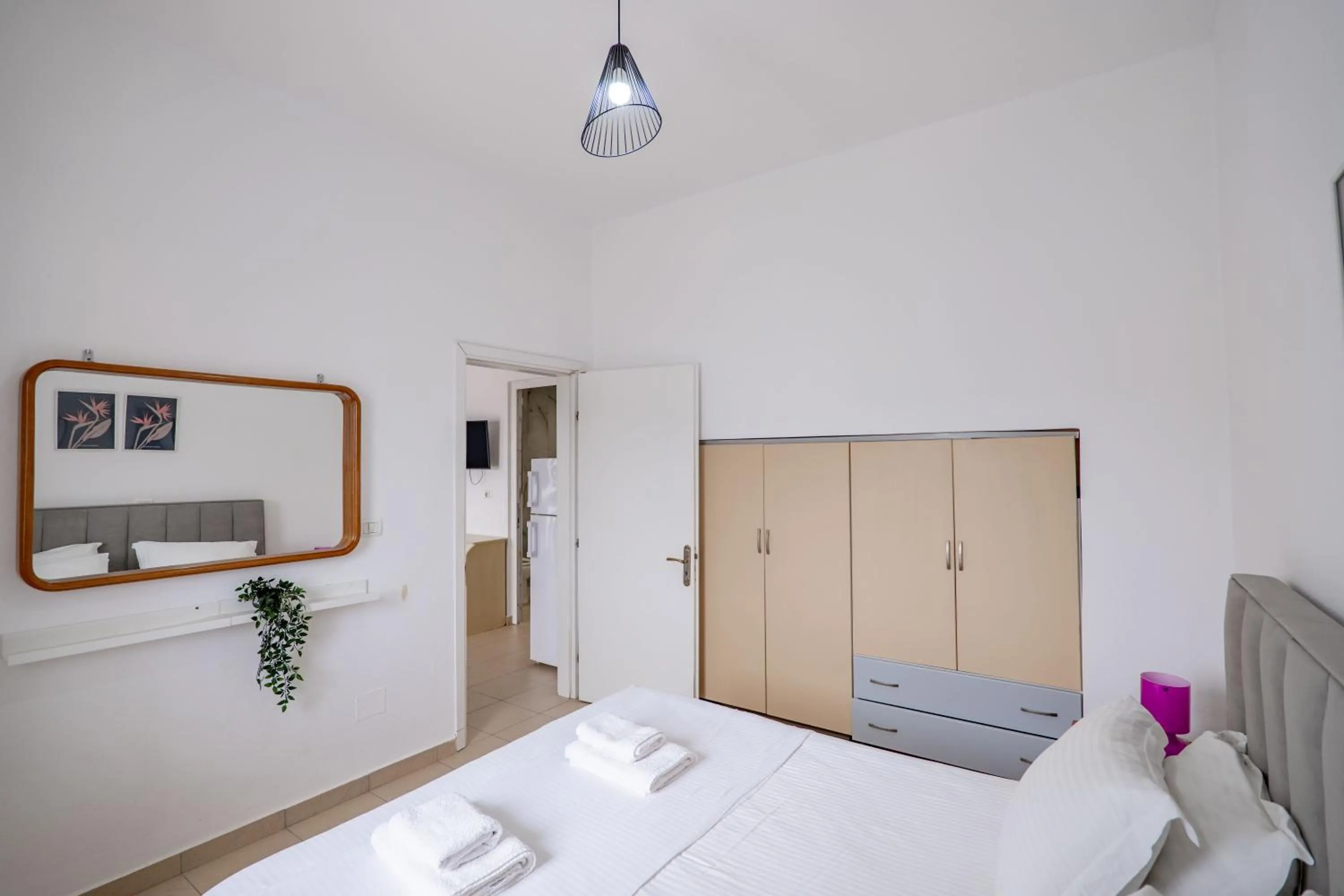 Photo of the whole room, Bed in Gregory's Apartments